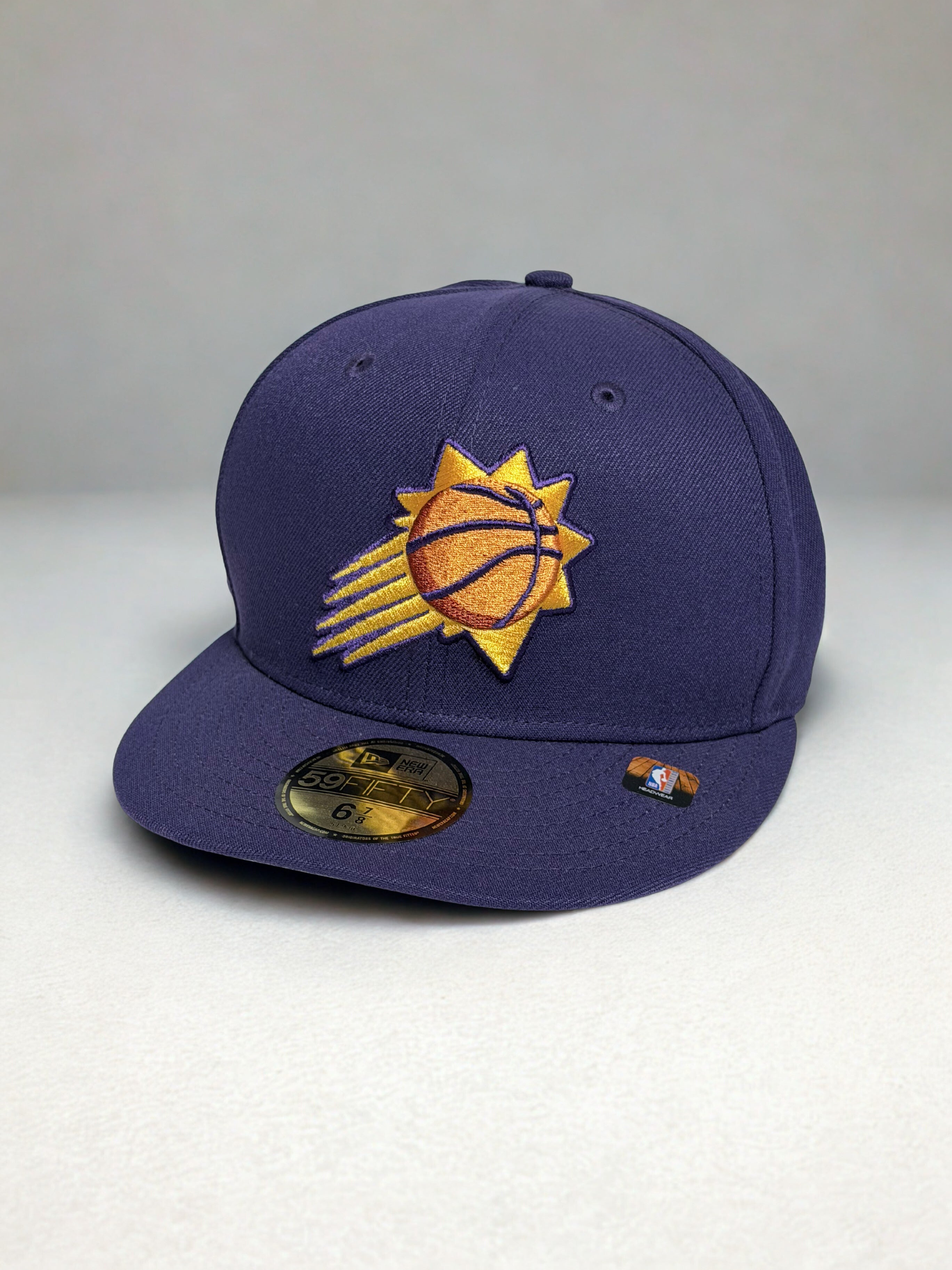 Purple Phoenix Suns cap with logo