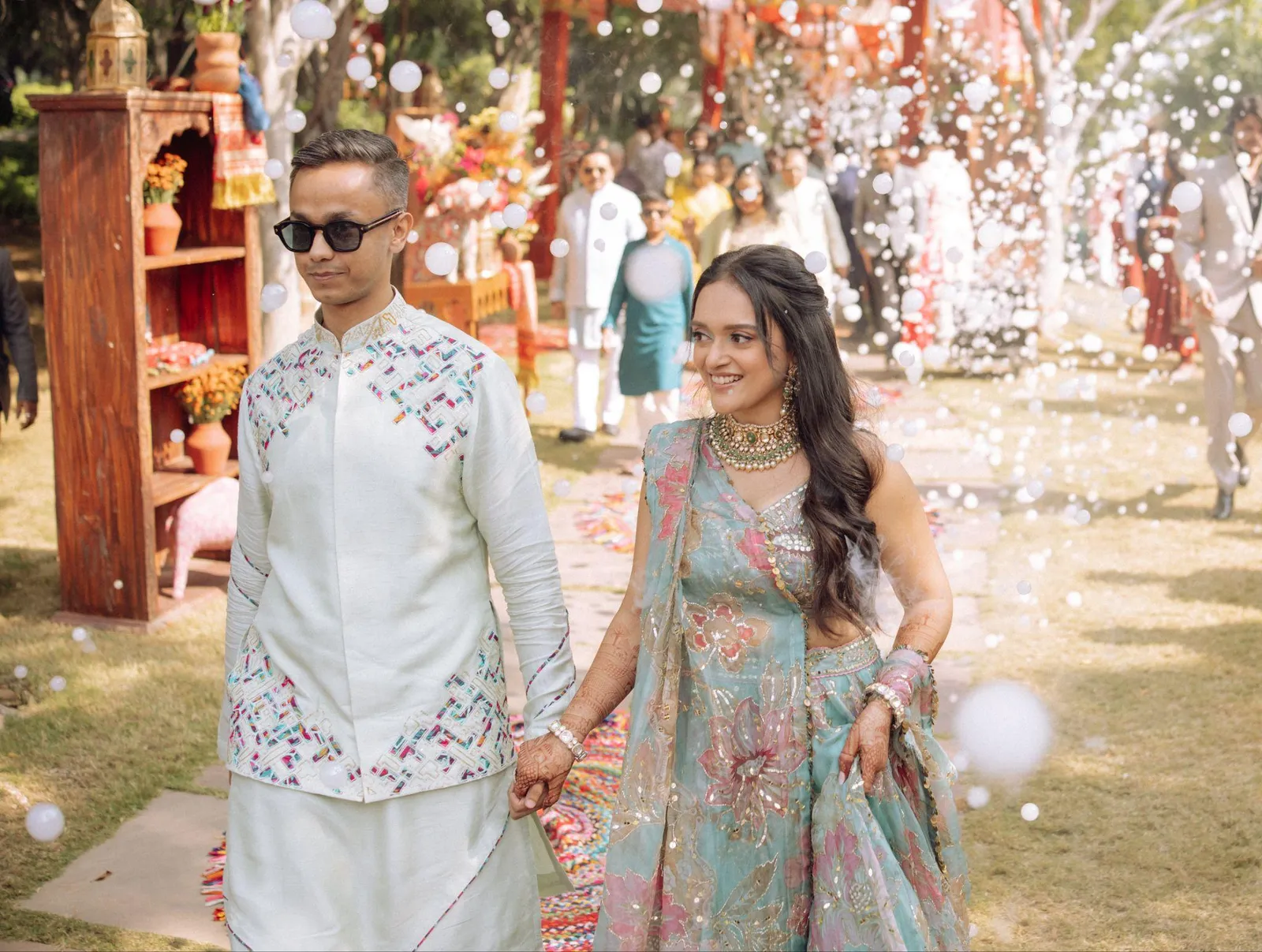 Simran and Shivanshu bohemian Mehendi décor in rustic orange with marigold and wicker — Behind The Scene real wedding