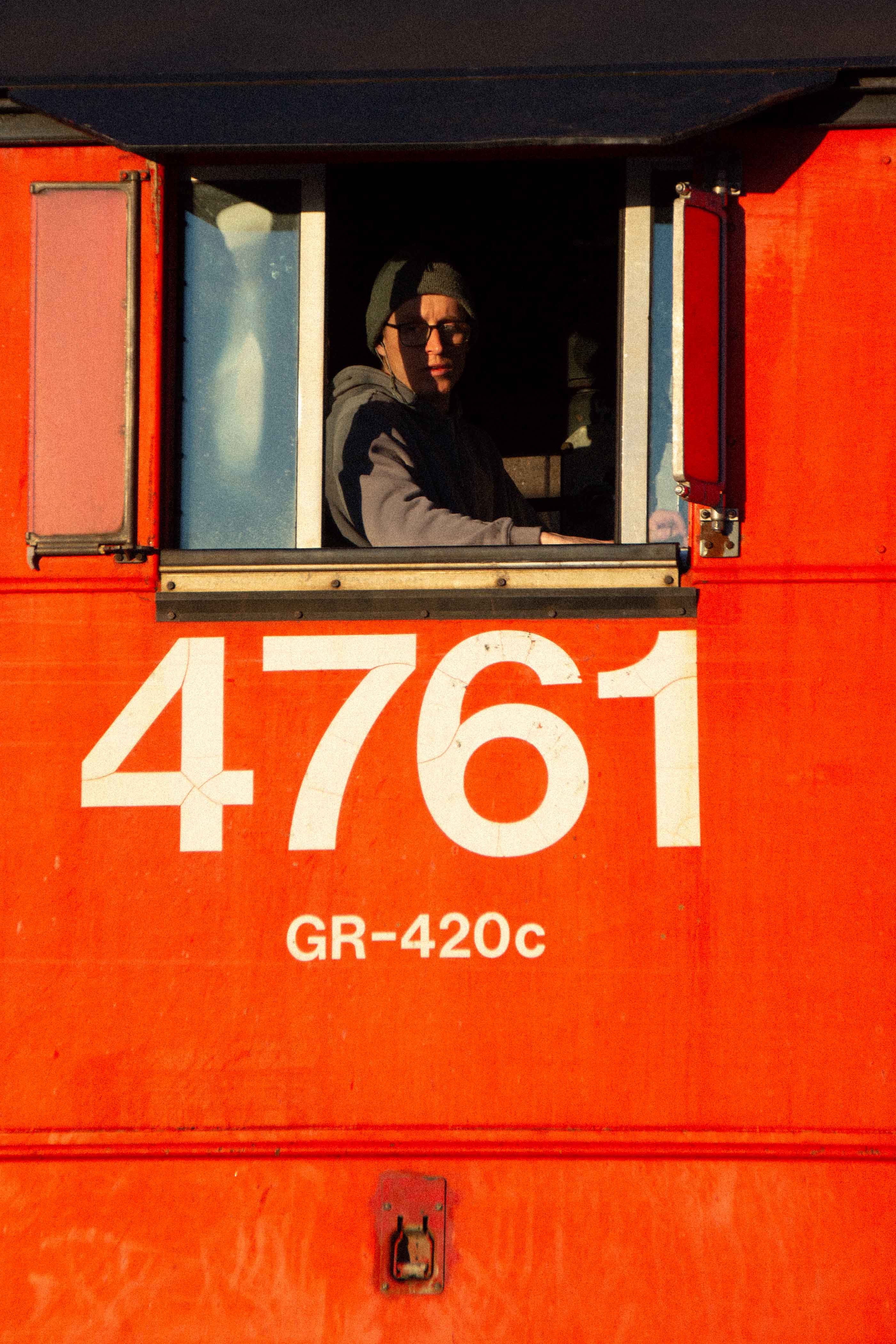 A studio space showcasing large window and contemporary design elements