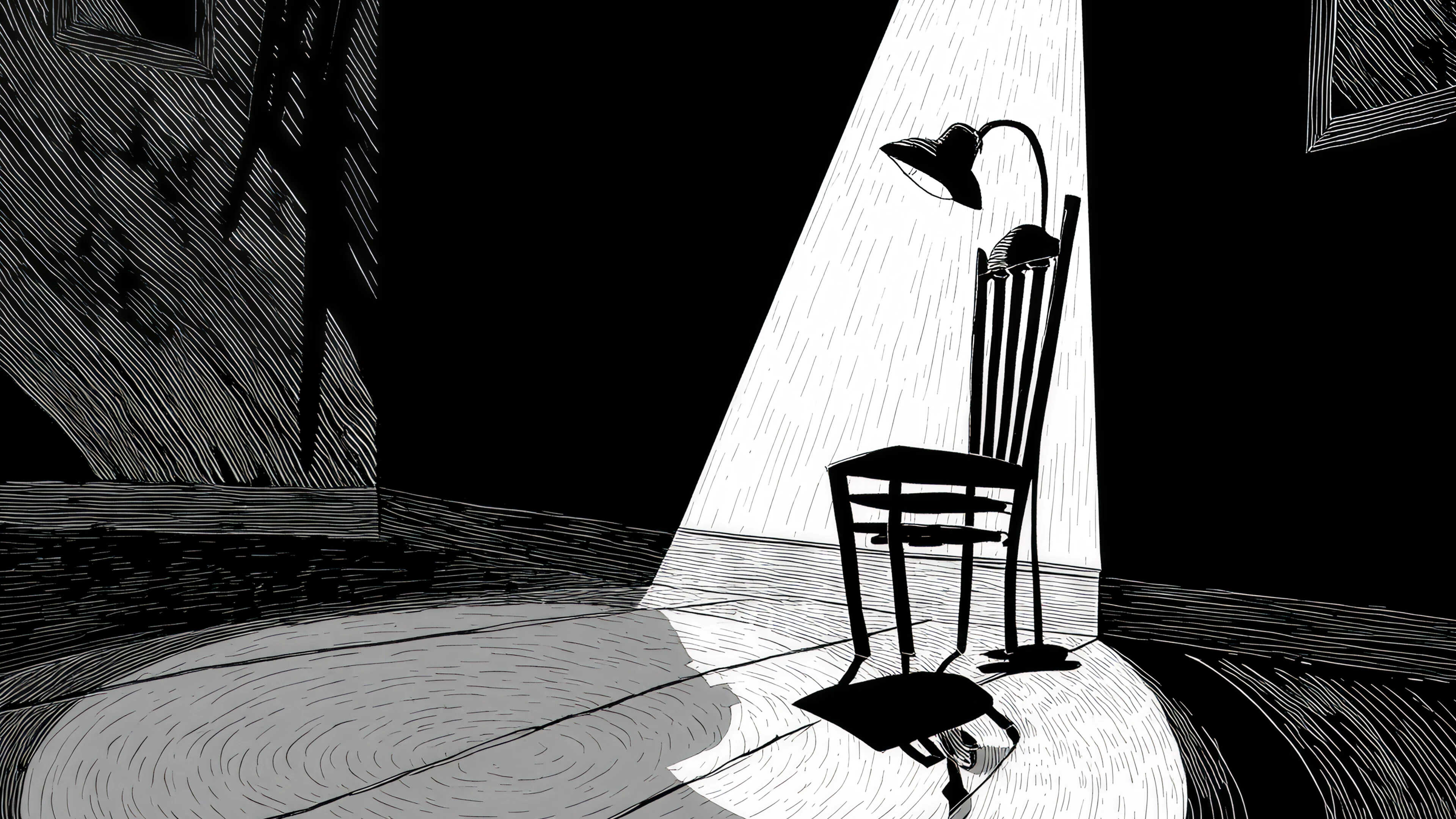 A chair highlighted by a focused beam of light in a dark room