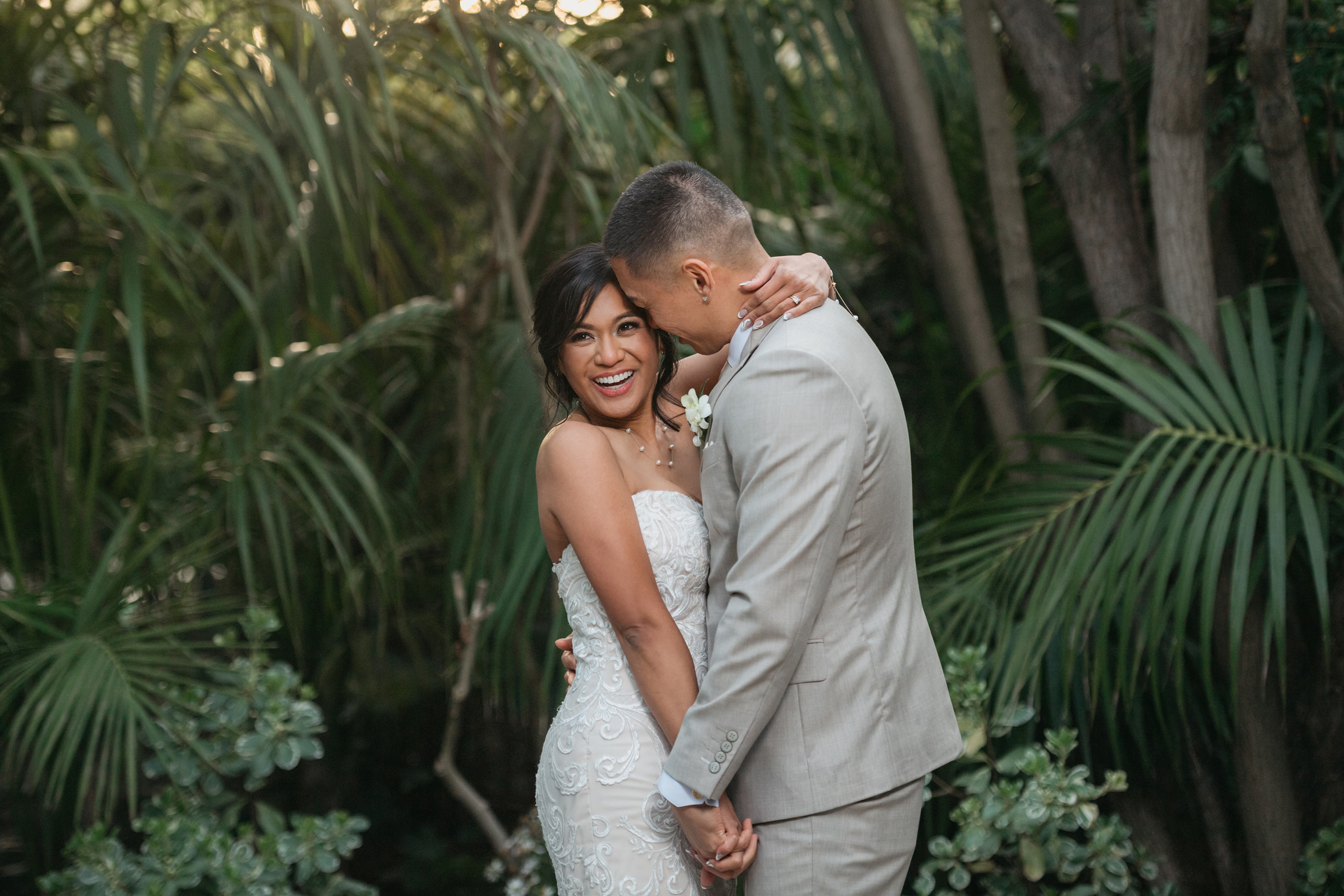 Flat lay wedding details with bouquet, rings, and sparkling bridal heels