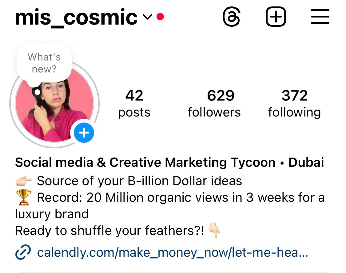 black DSLR camera floating over man's hand at the woods