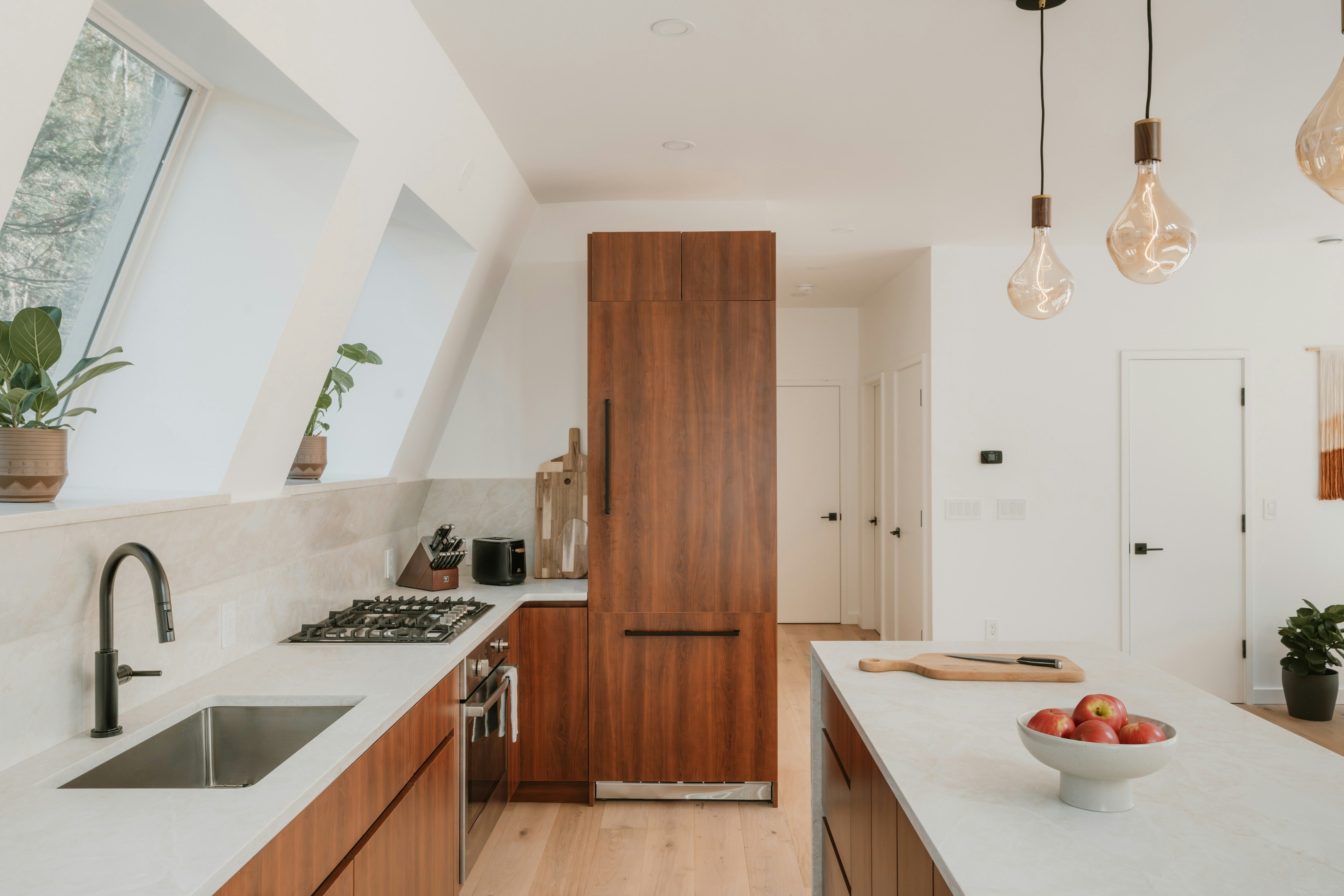 Kitchen remodel with stone worktops and contemporary cabinetry