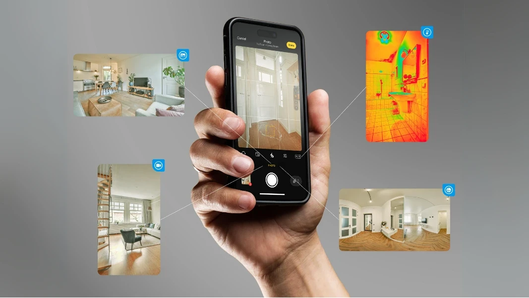 hand holing a phone to document water damages