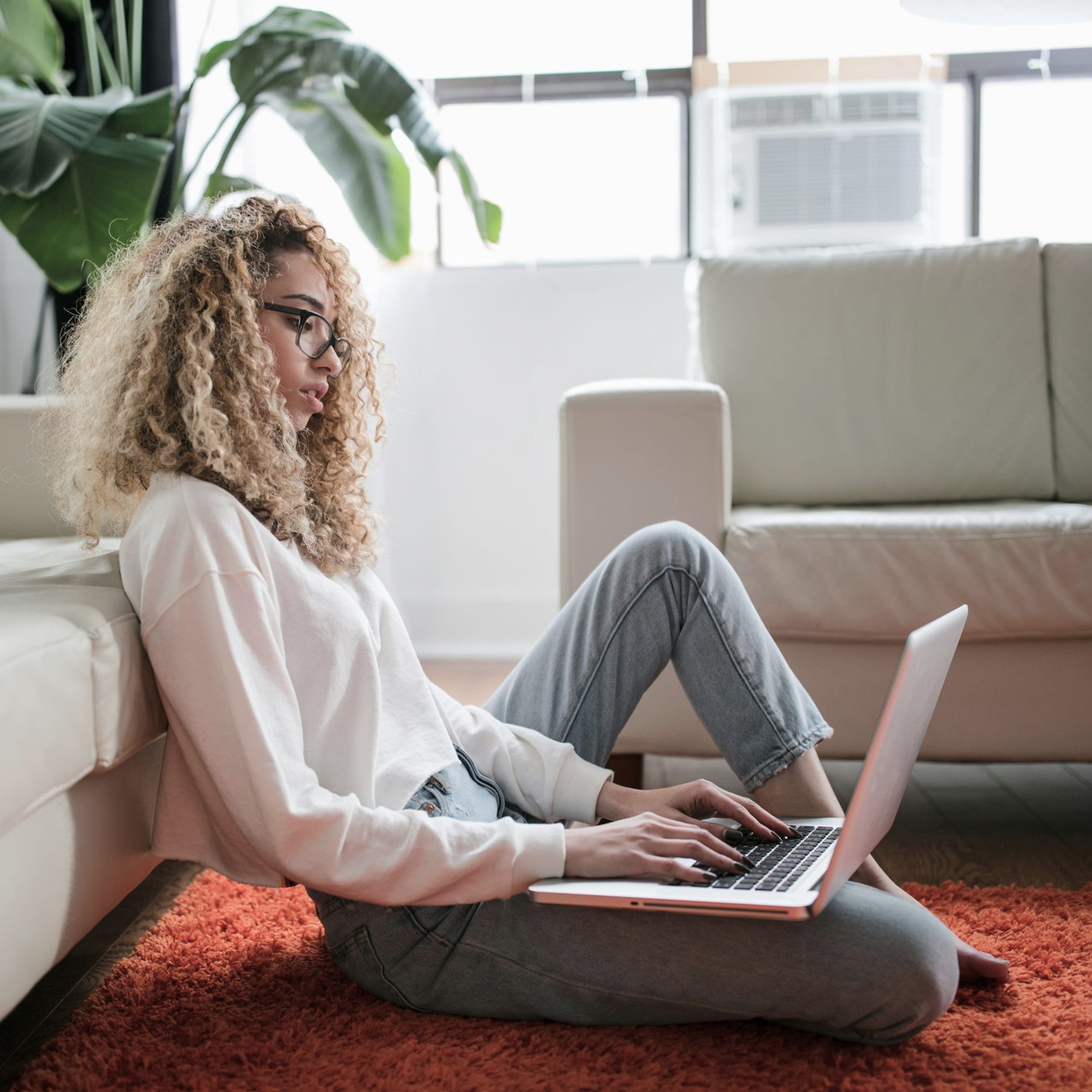 Person Online Shopping with a Laptop