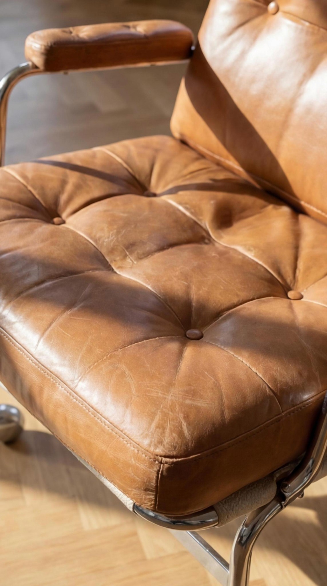 Close-up of a green palm leaf with intricate veining and texture, showcasing rich shades of green.