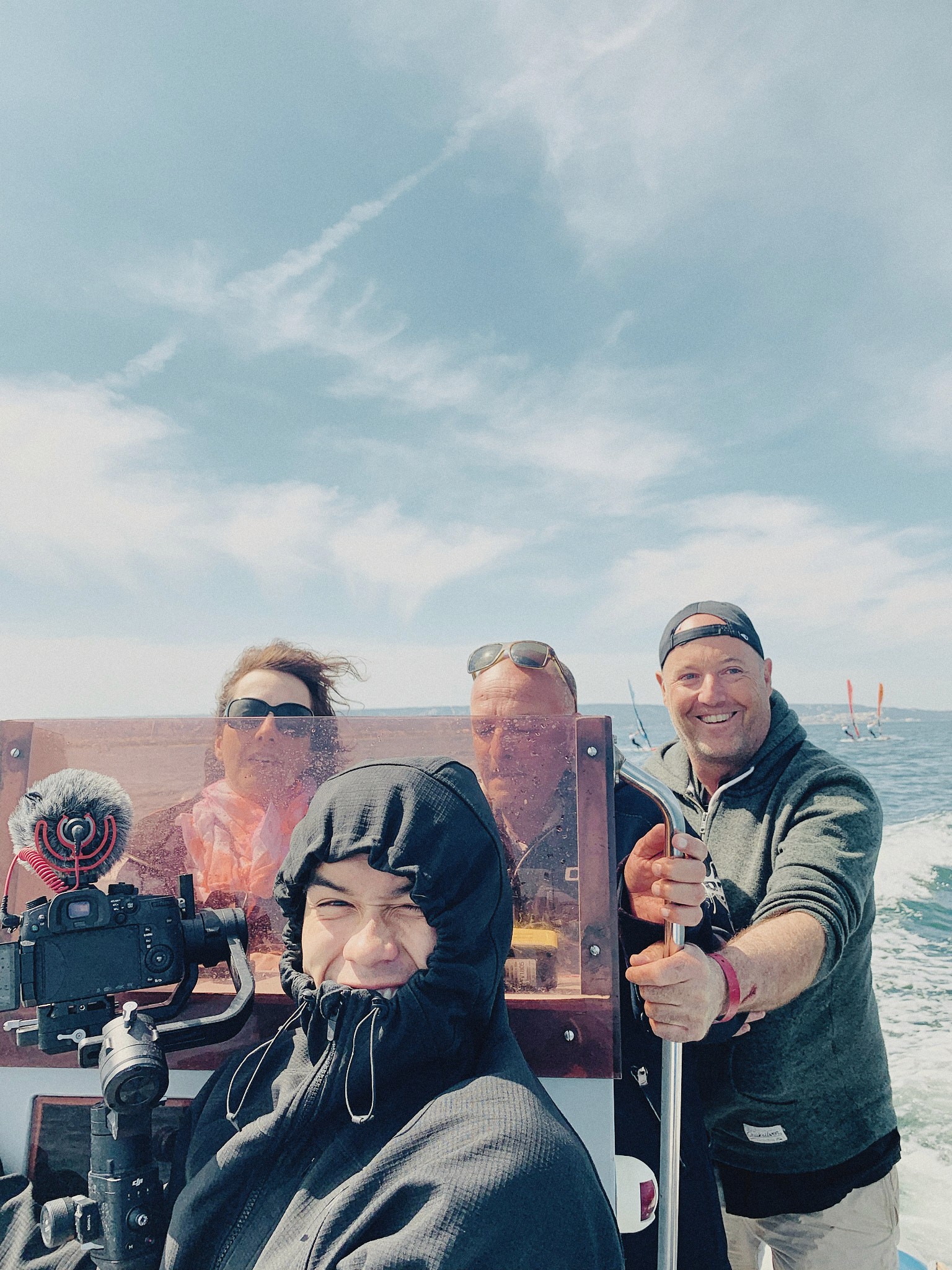 Alex with the boat crew on filming location