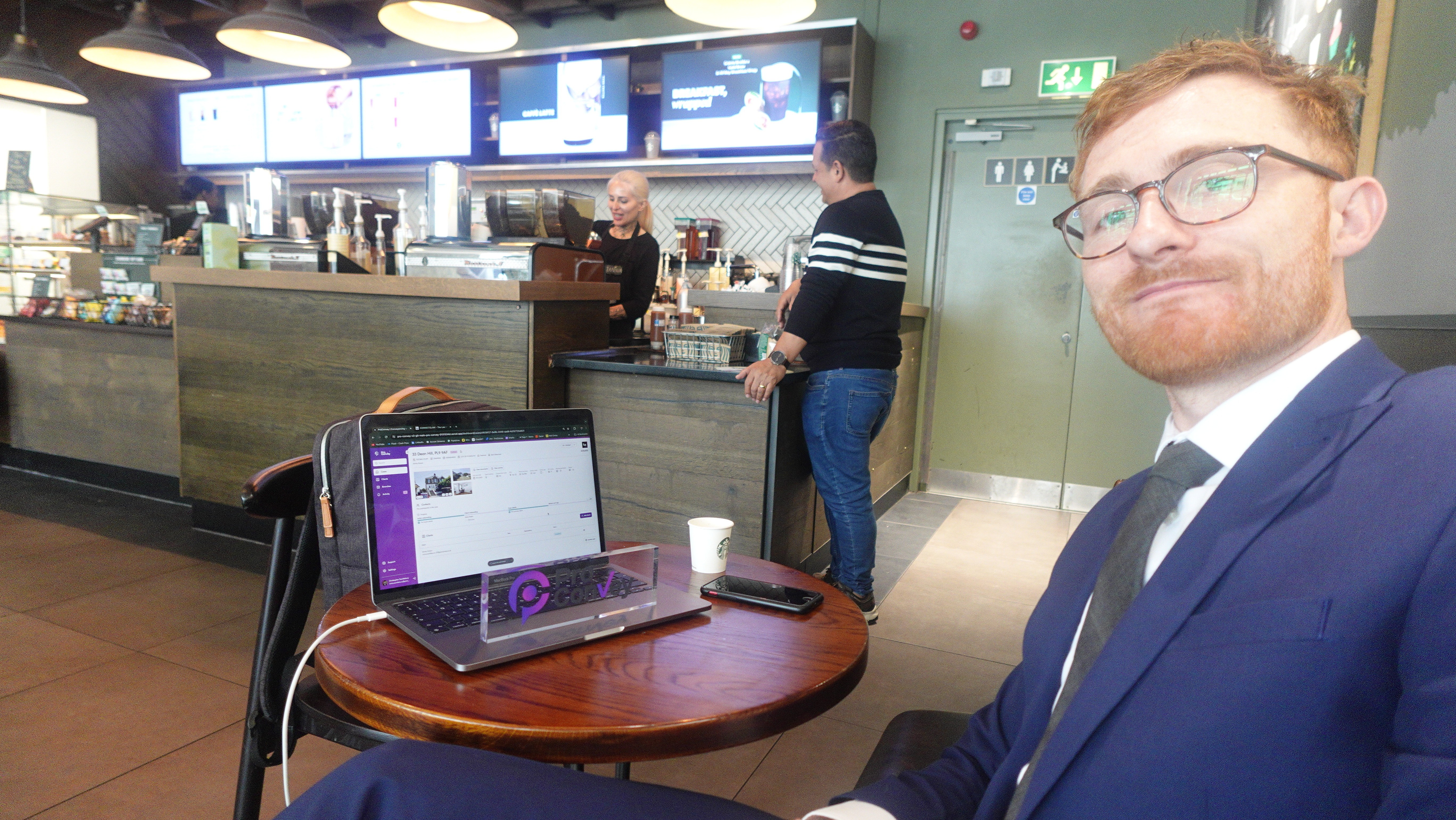 ProConvey Managing Director using ProConvey conveyancing software in an cafe