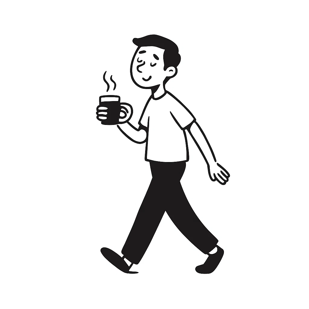 clear drinking glass with coffee on top of white table