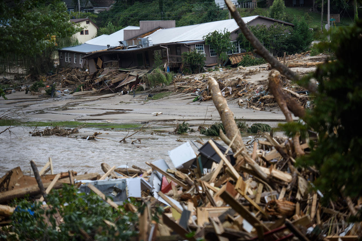 The Rocky Broad River flows into Lake Lure and overflows the town with debris from Chimney Rock, N.C. after heavy rains from Hurricane Helene, on Sept. 28, 2024. Credit - Melissa Sue Gerrits—Getty Images