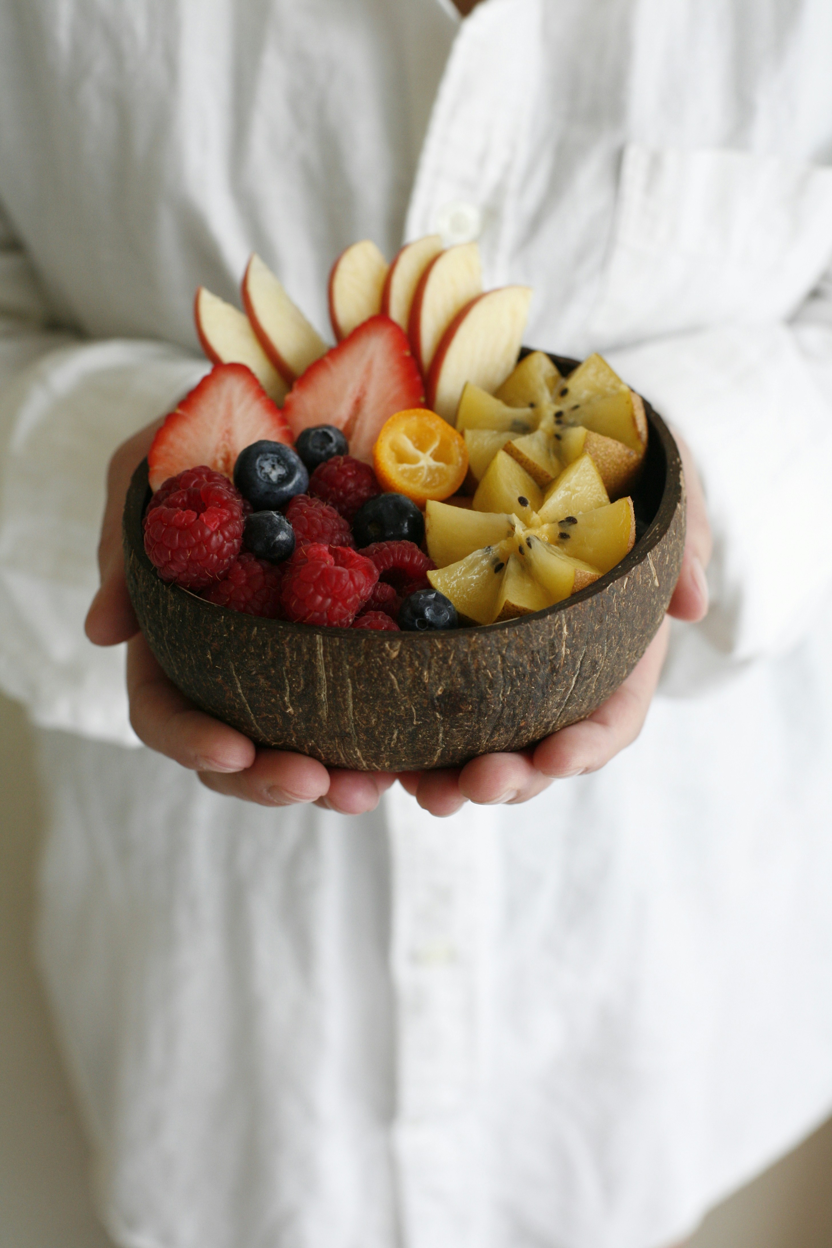 Bowl topped with fresh fruit, a simple protein- and fiber-forward option for days when your appetite cooperates.