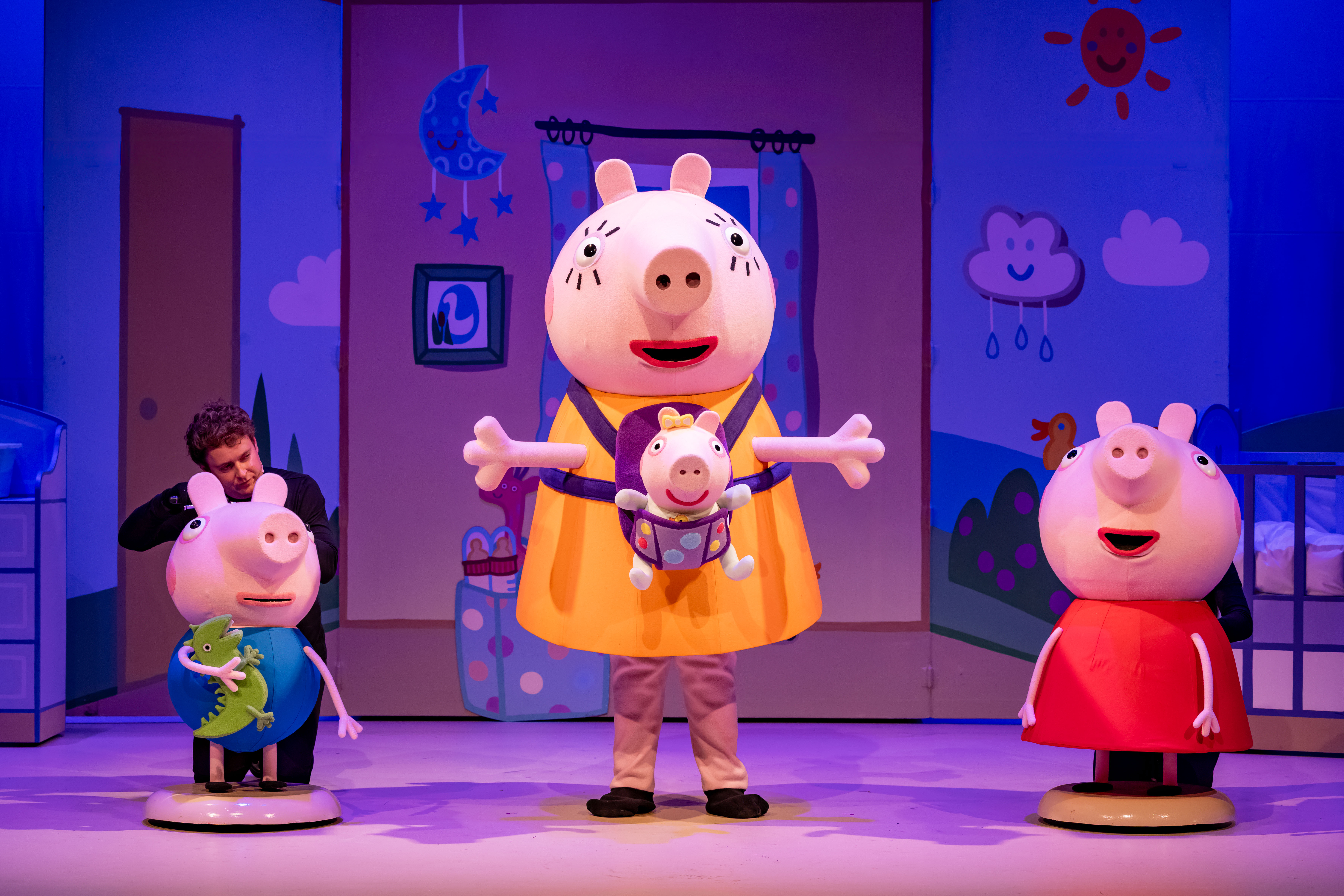 Mummy Pig, Peppa and George onstage in Peppa Pig’s Big Family Show.