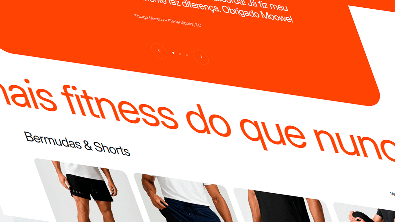 Two colleagues collaborating over paperwork at an office desk, with plants in the background.