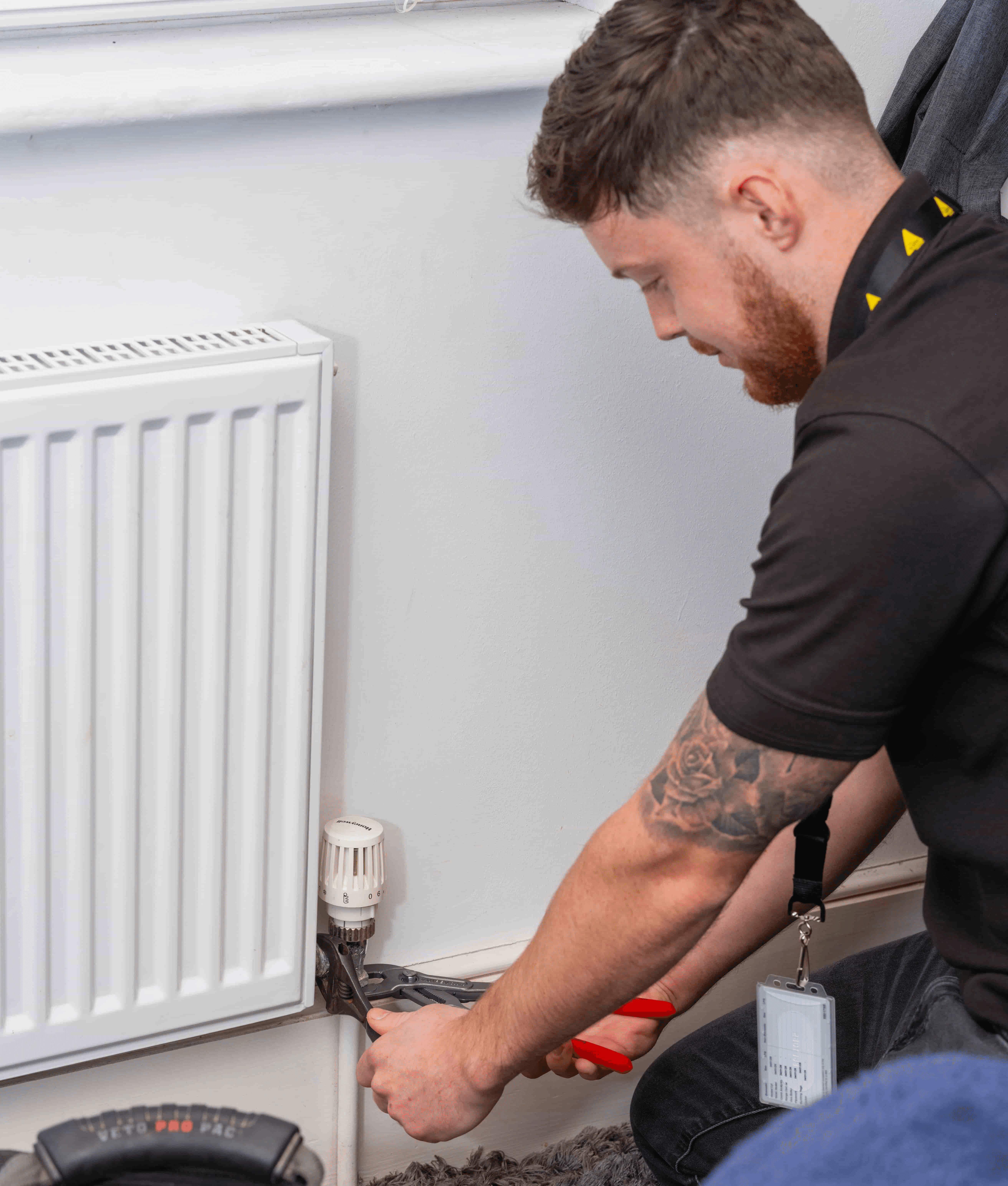 Gas safe registered engineer installing central heating system in north london
