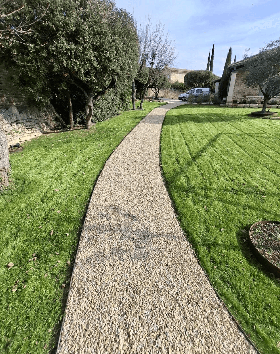 a small wooden building with a wagon in front of it