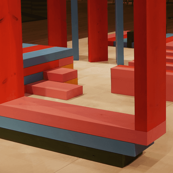 Exhibition installation made from colourful, modular timber blocks