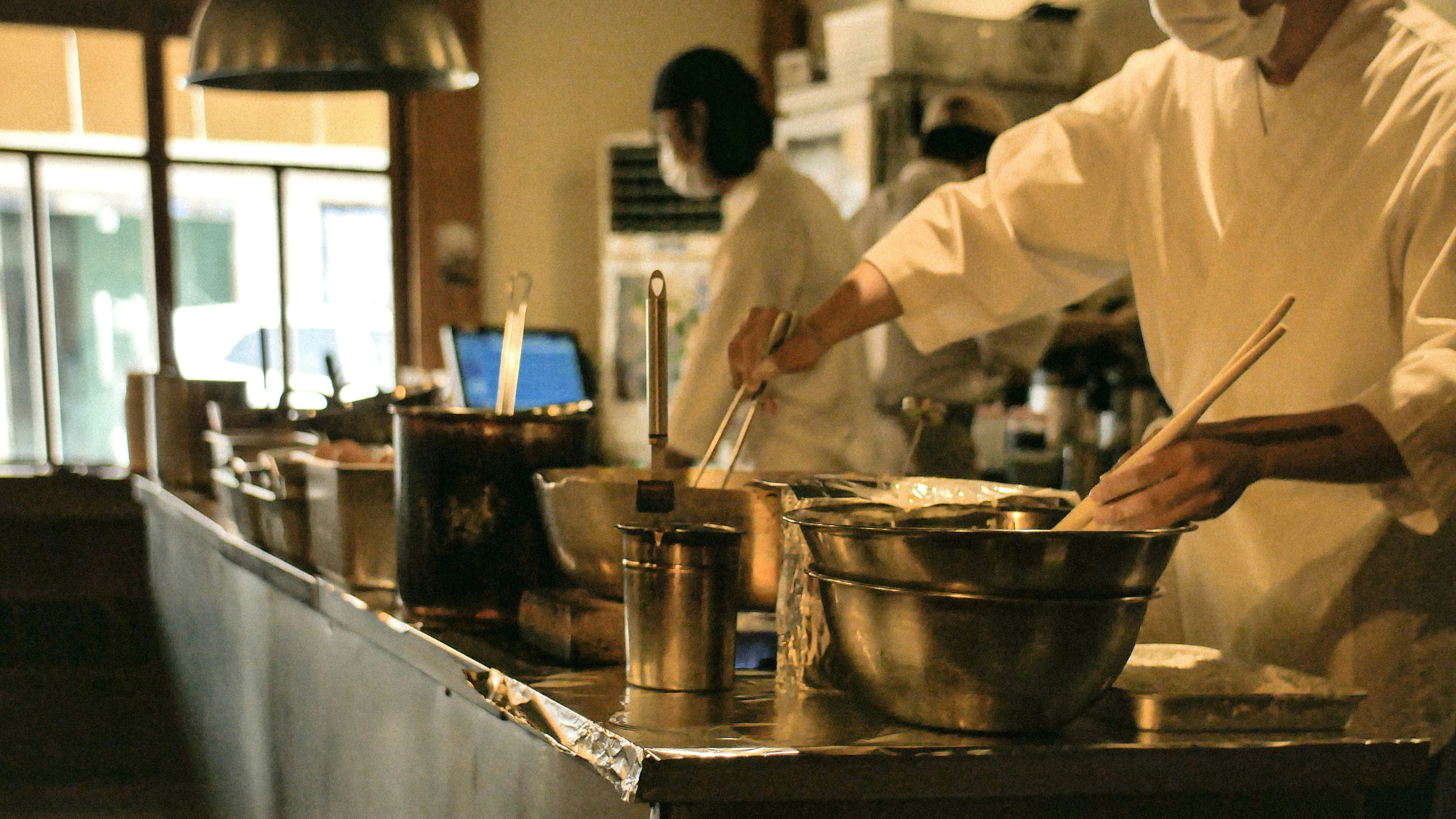a chef cooking in a kitchen