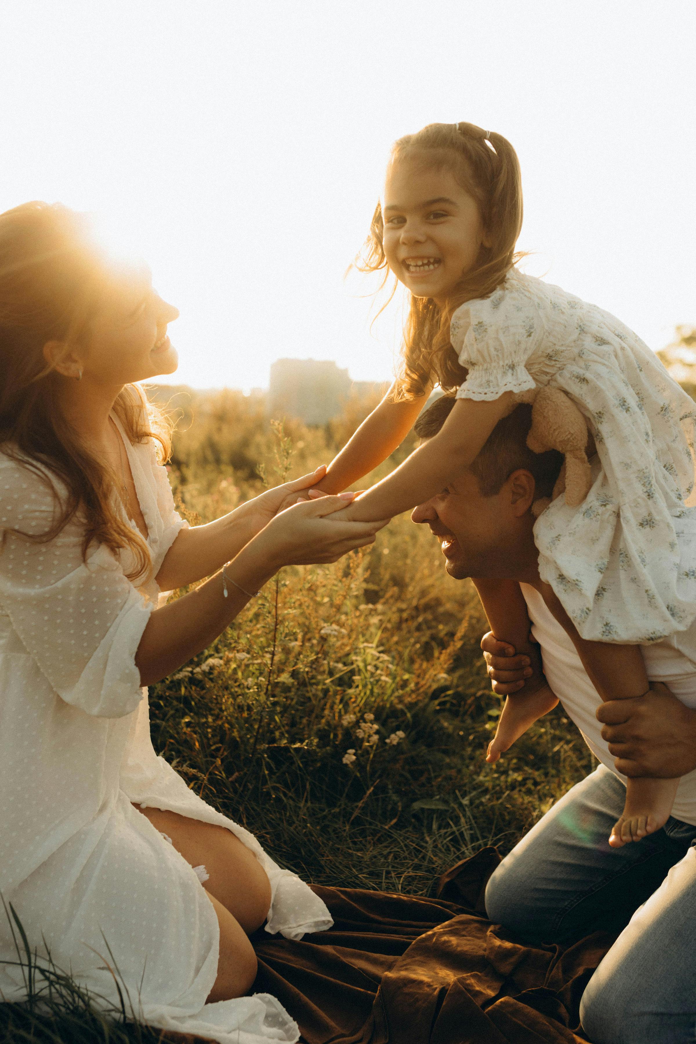 husband and wife working happily on a laptop