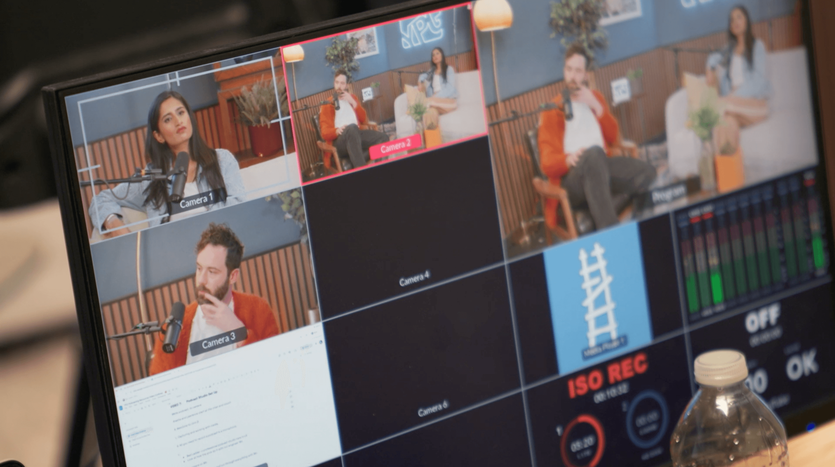 a laptop computer sitting on top of a desk