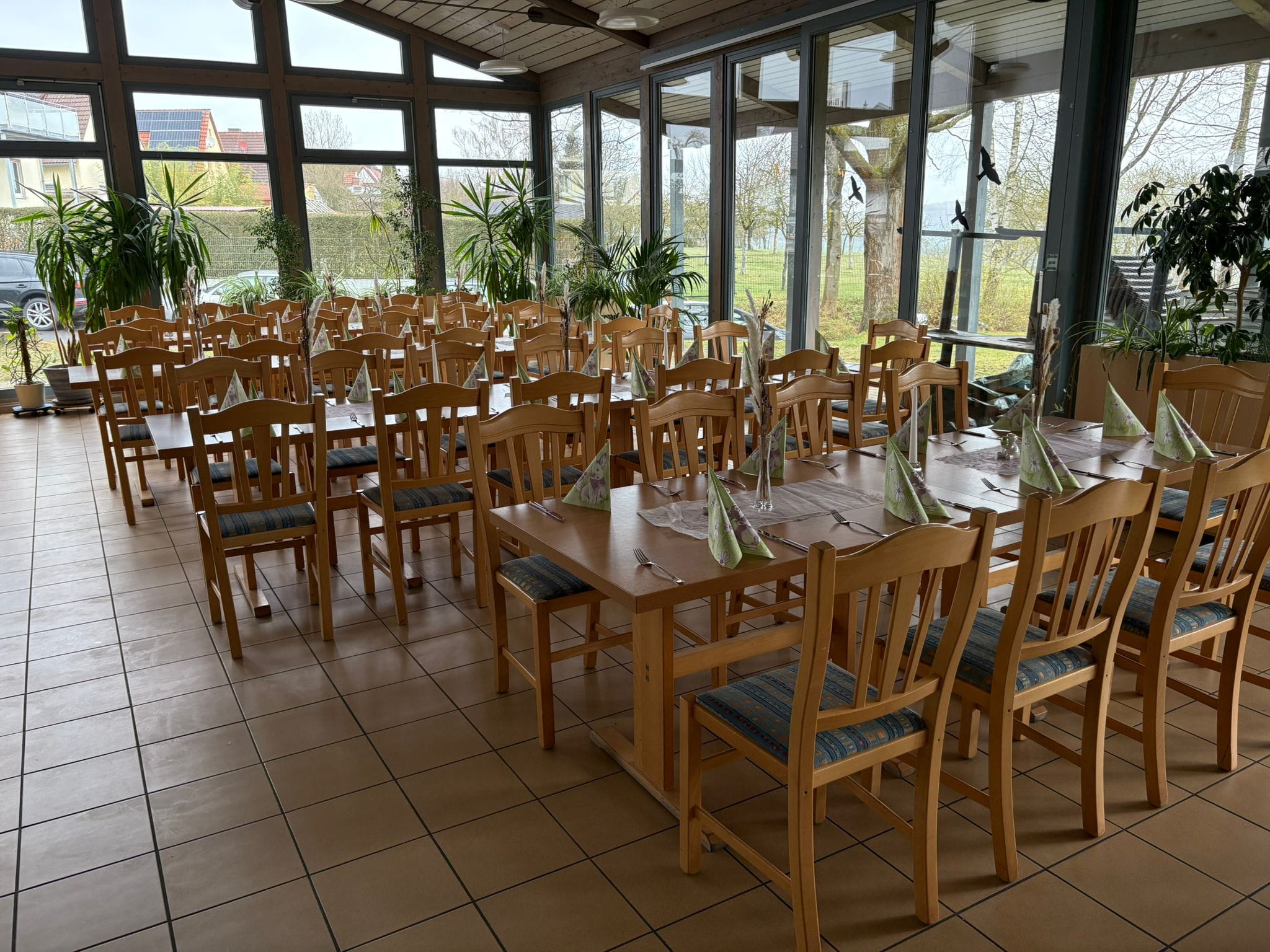 an interior of a fine dining restaurant with focused shot on the table with the plates and glass has been served