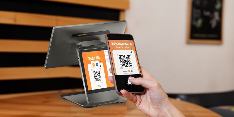 A customer claiming their cashback on the StoreHub POS system