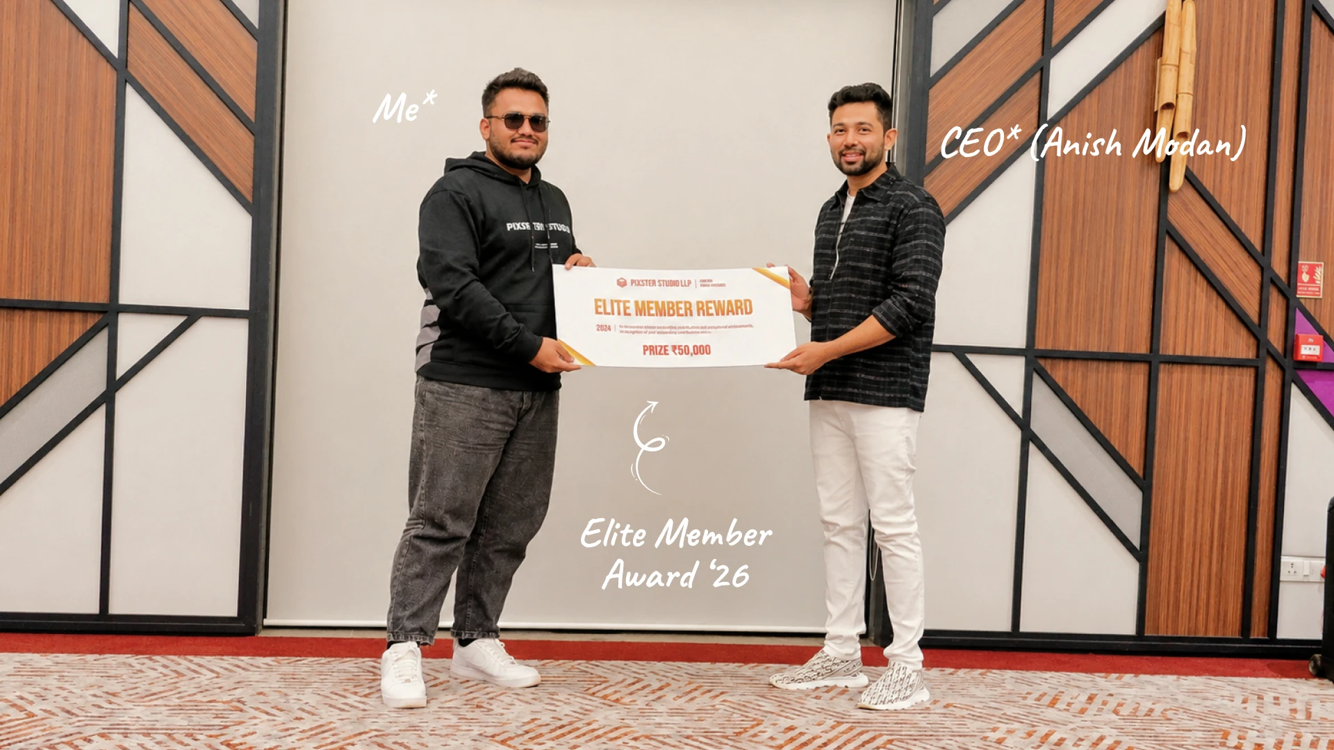 Sujat Sayyed receiving an Elite Member Award at Pixster Studio
