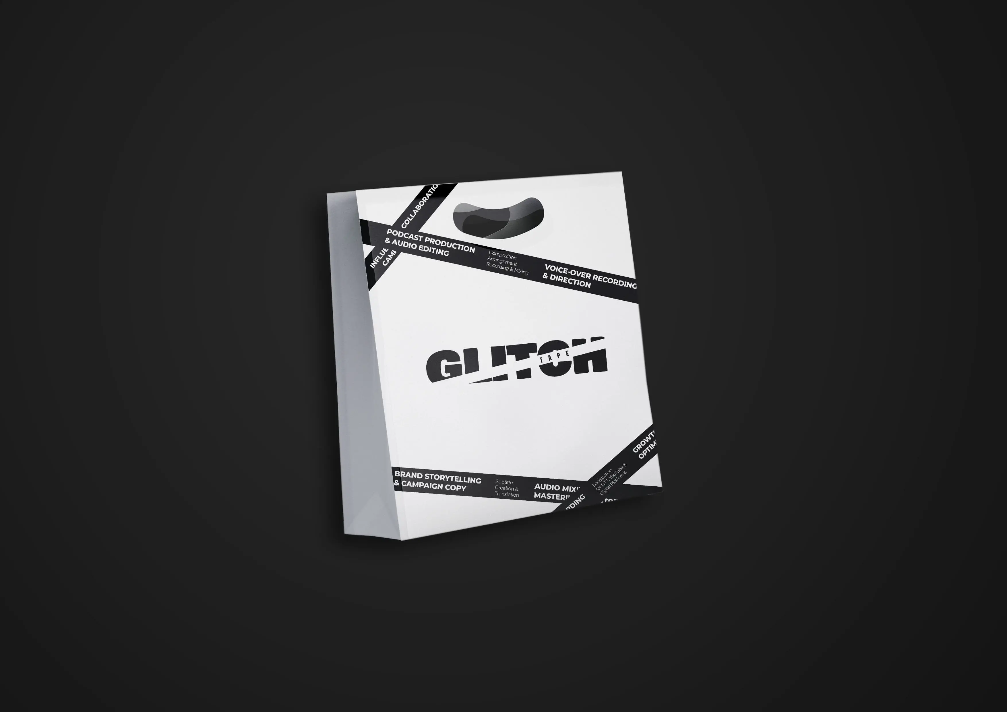 Angled white product box with bold black “GLITCH” branding and diagonal label bands, isolated against a dark background for a modern, stark tone.