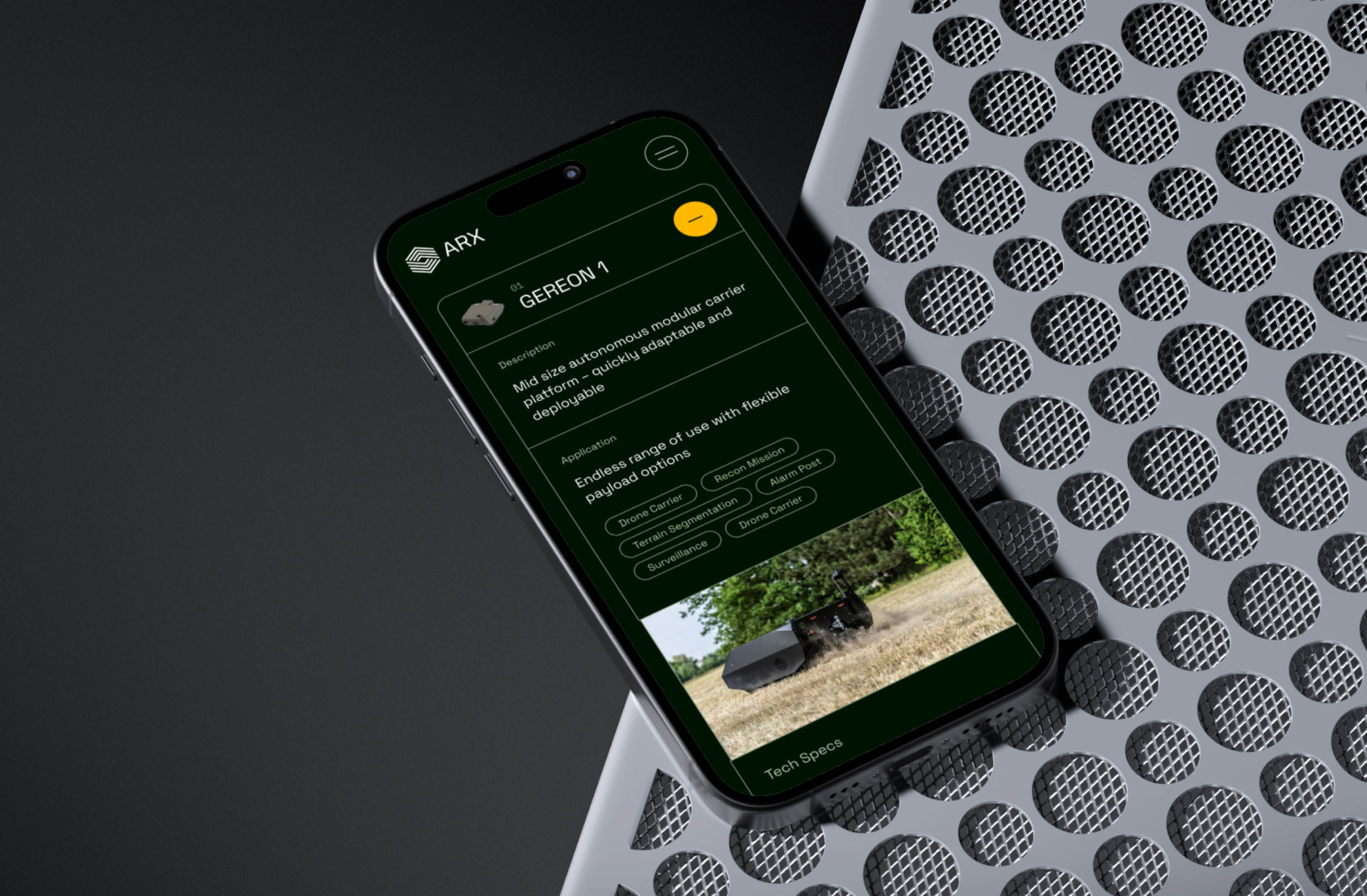 Image shows a smartphone displaying features of the GEREON 1 modular autonomous carrier robot against a perforated metal background.
