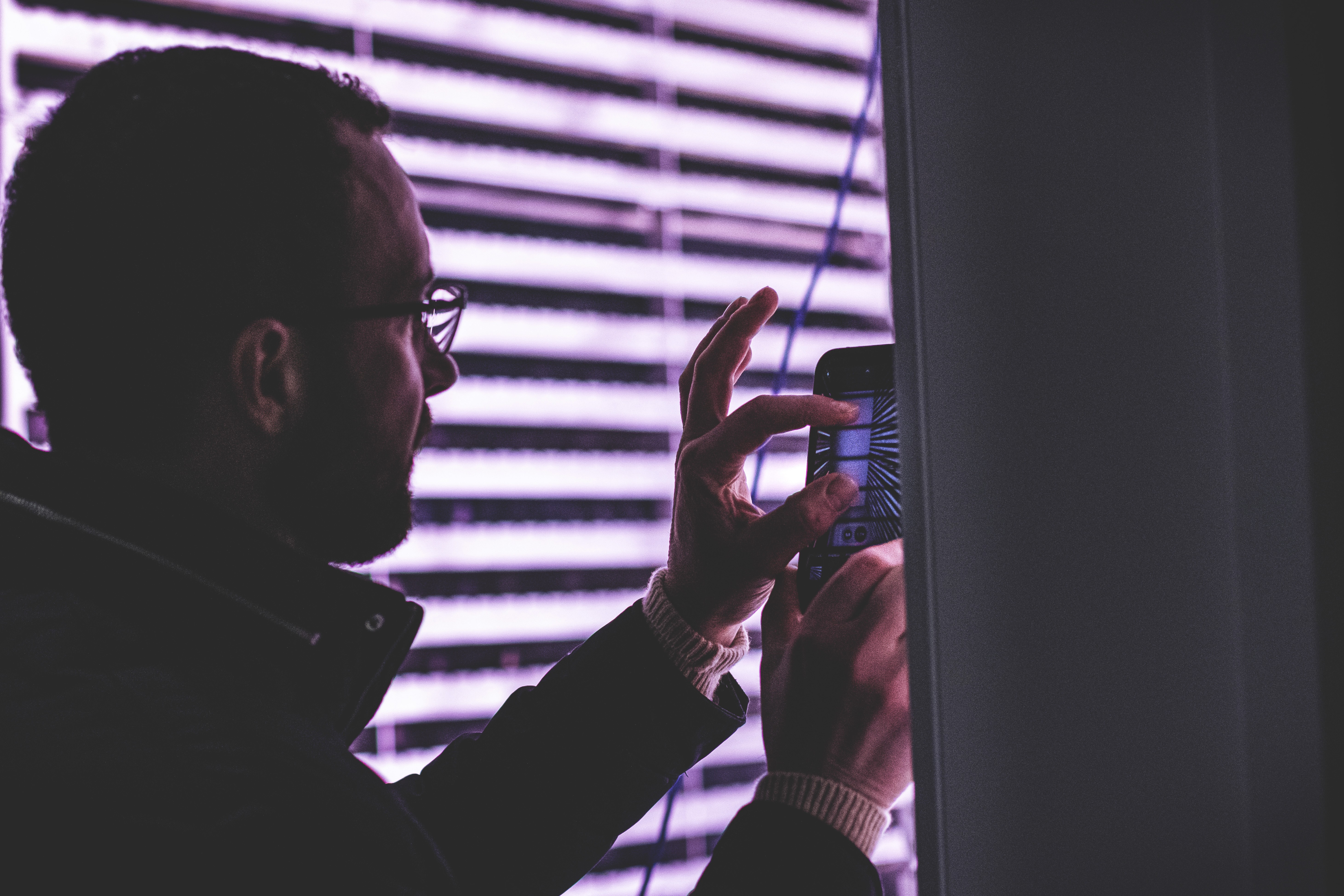 Close-up of a tree stump showing growth rings and a textured brown wood surface.