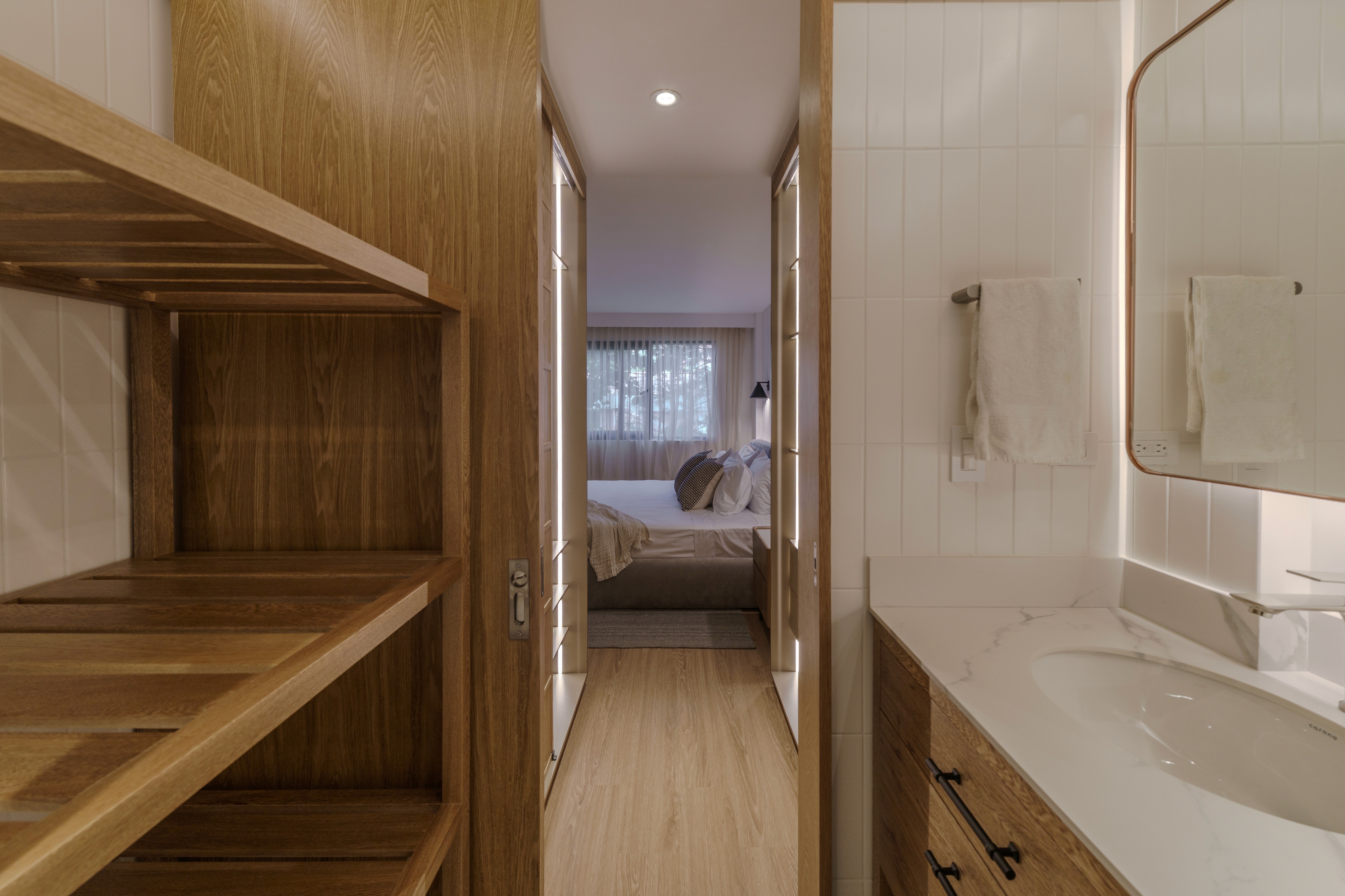 Double-height interior with flowing sculptural forms and warm raking light
