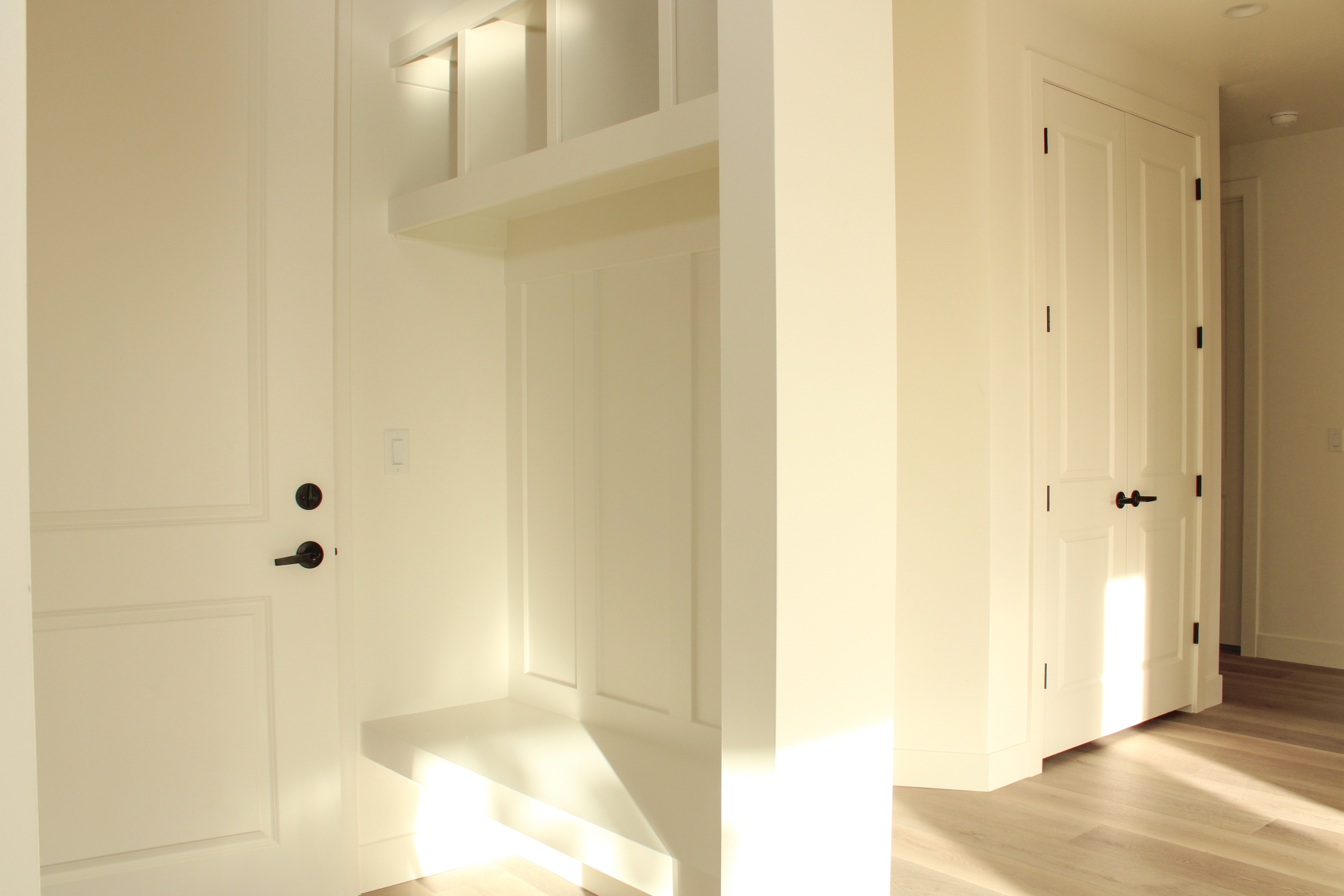 Built-in mudroom bench in a home in Hurricane Utah designed for functional space.
