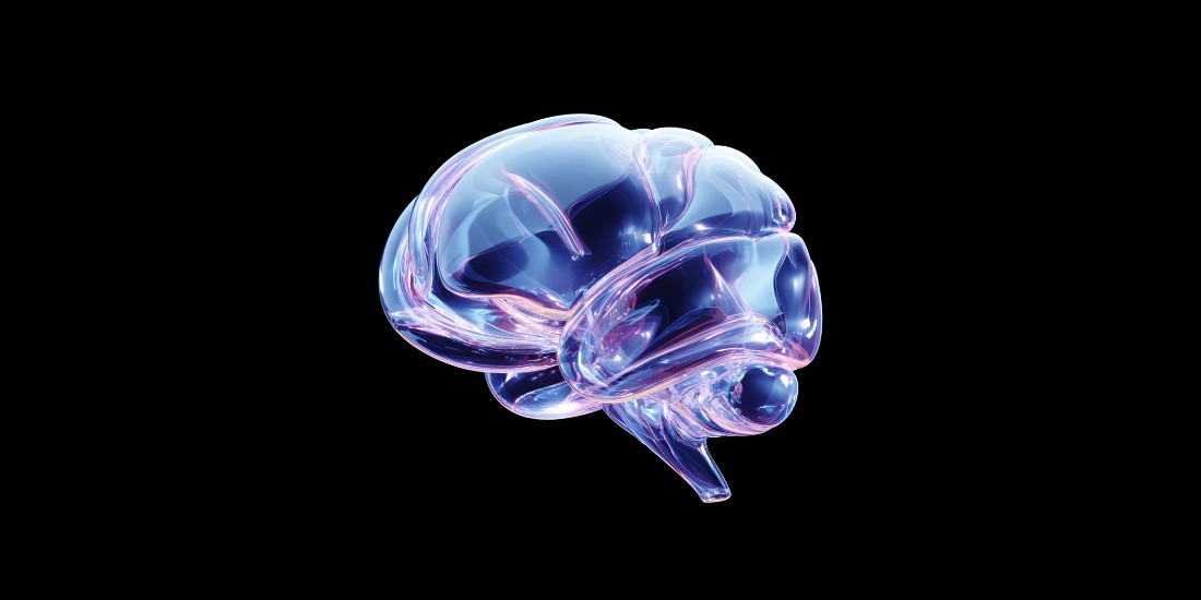 3D glass brain icon on black background