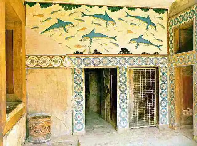Colorful mosaic artwork of dolphins on studio wall, vibrant and artistic.