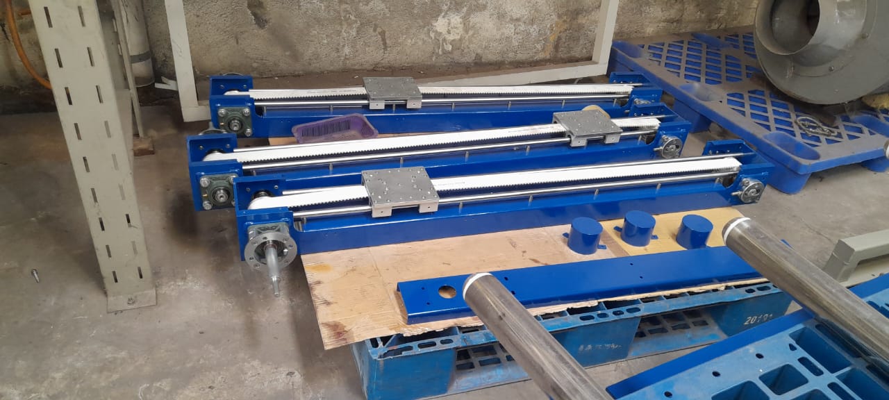 Assembly of the main filling machine structure on the workshop floor.	