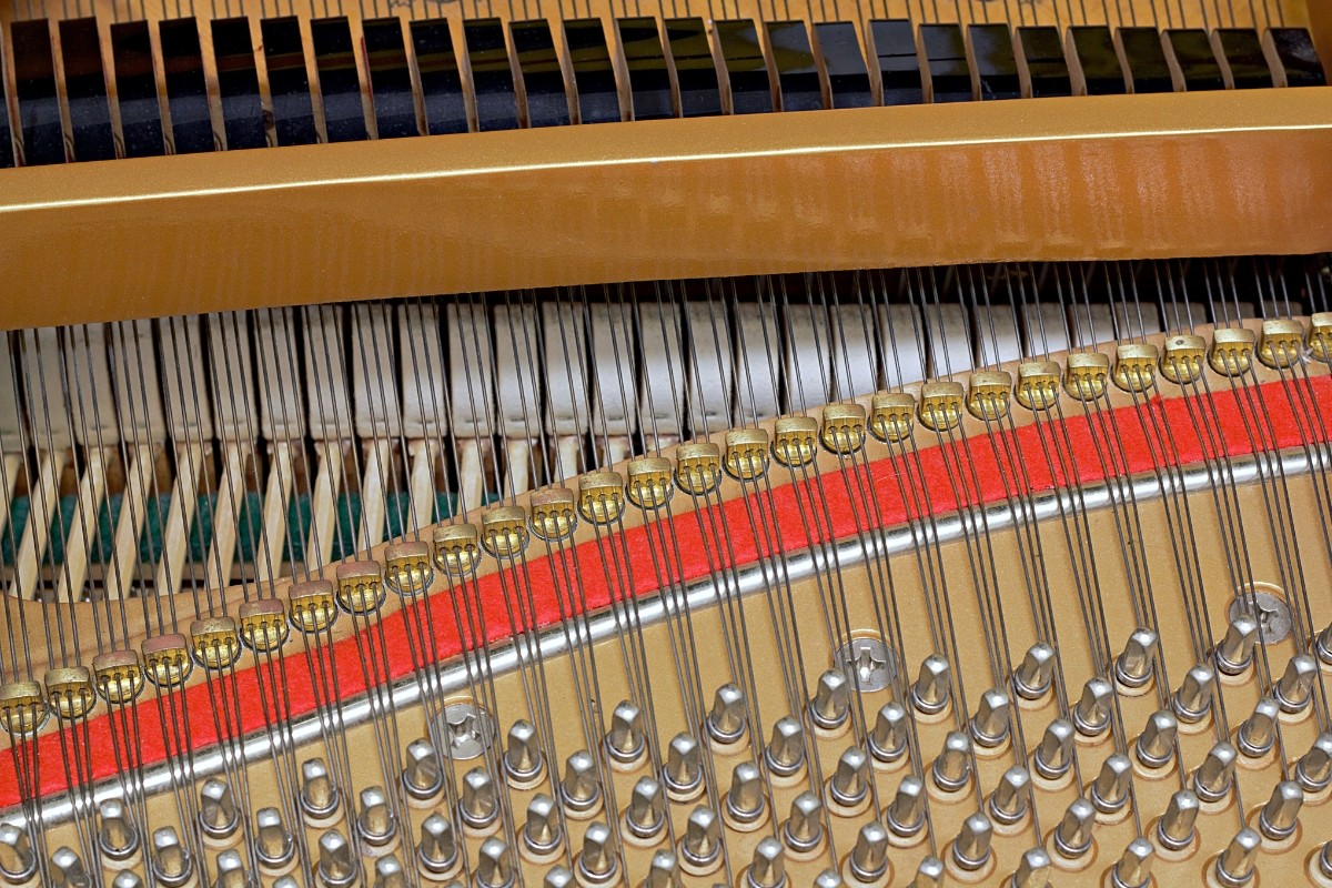 Each string is under ~150–200 lbs of tension