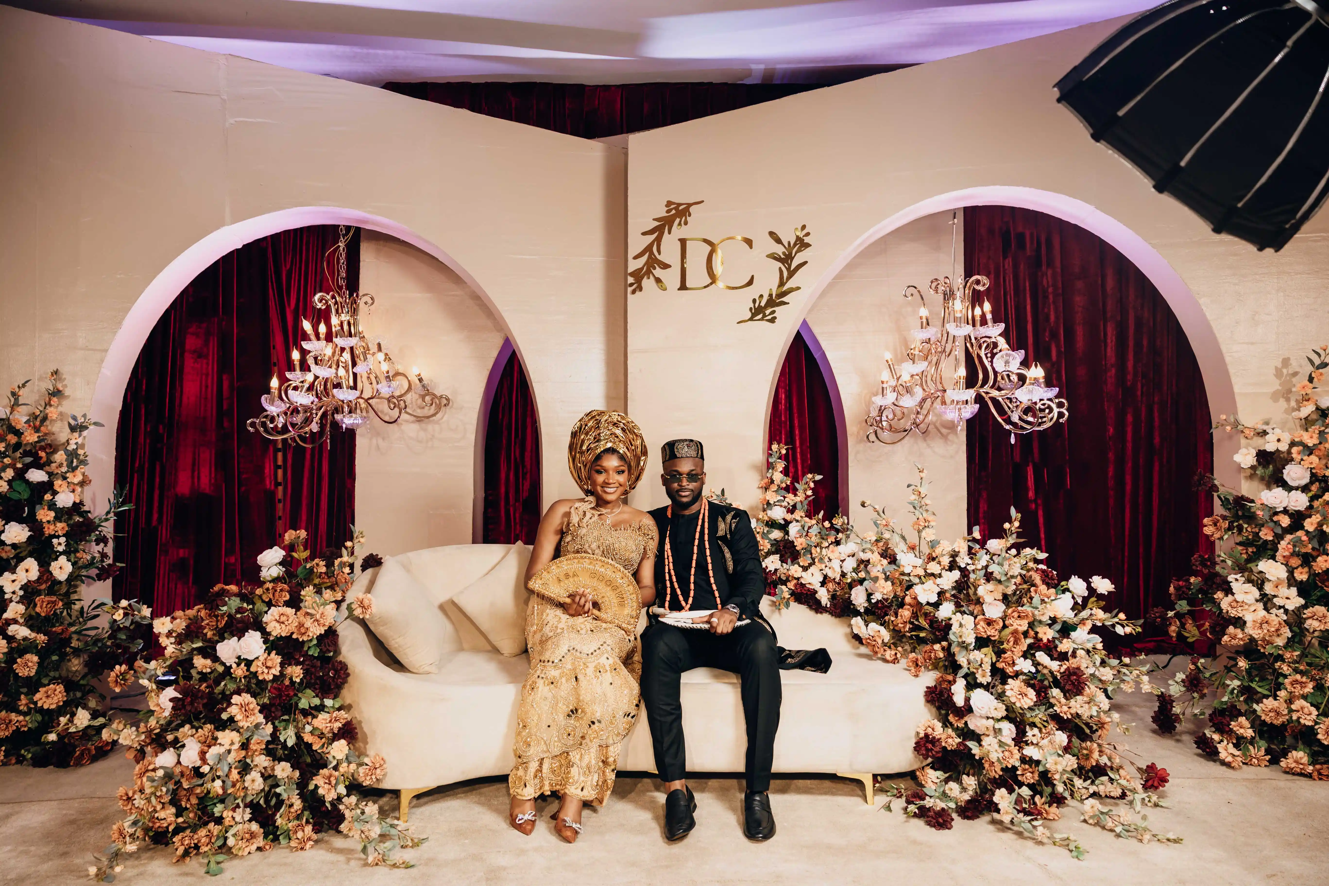 Newlyweds celebrating their wedding ceremony with family and friends.