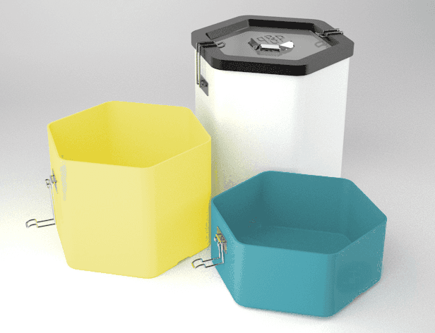 Three hexagonal containers are shown against a light gray background. The container on the left is yellow, the one on the right is teal, and the one on top is white with a black lid. Each container has a small metal clip attached to its side.