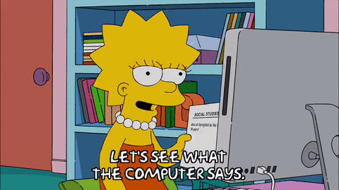 Lisa Simpson typing at computer with enthusiastic expression