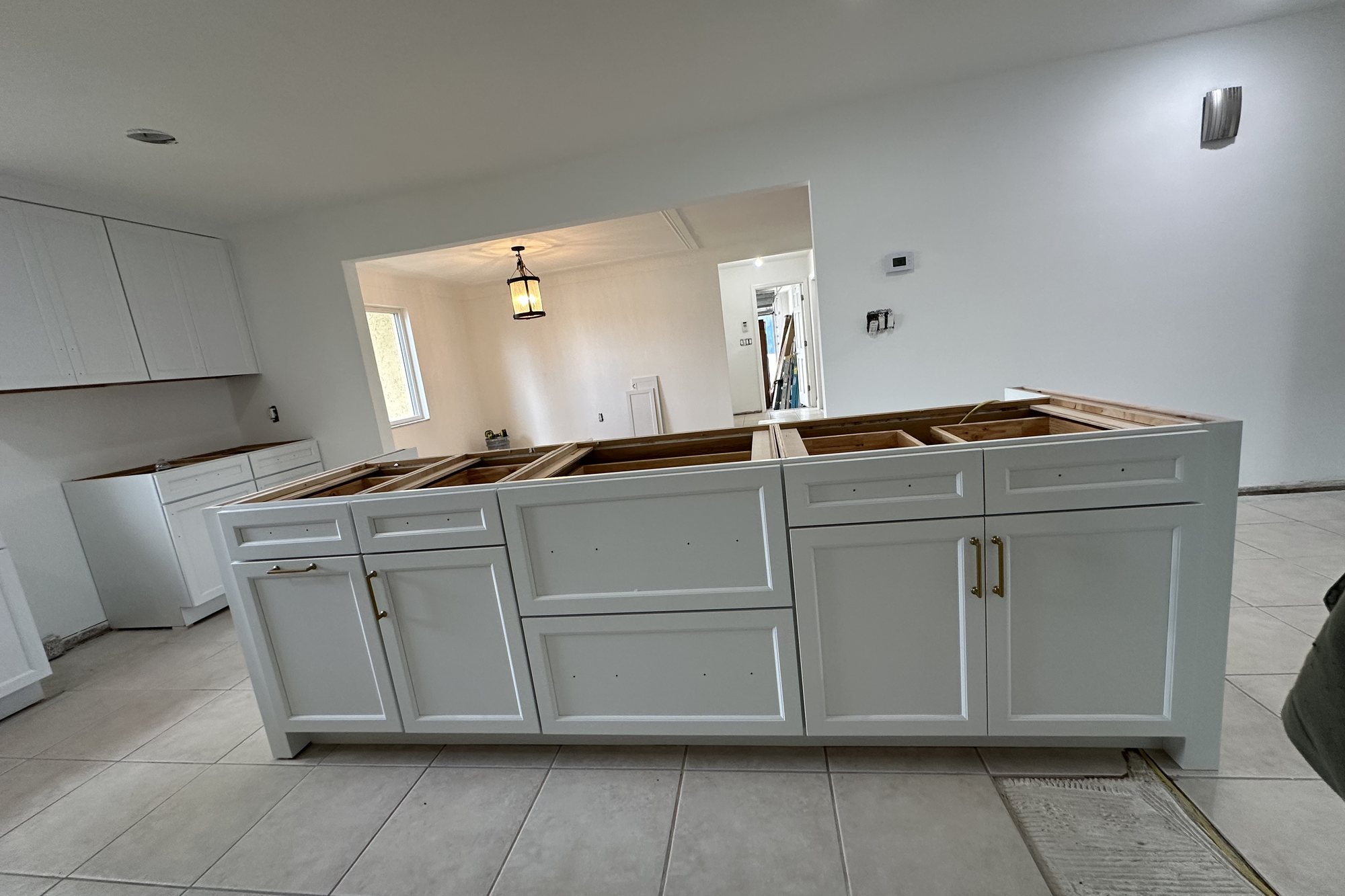 White Kitchen with a Large Island in Ruskin, Florida