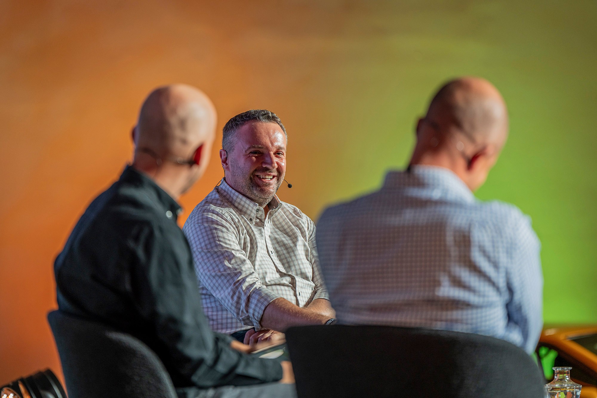 Martin Žufánek speaking during panel discussion at Money Maker conference in Prague
