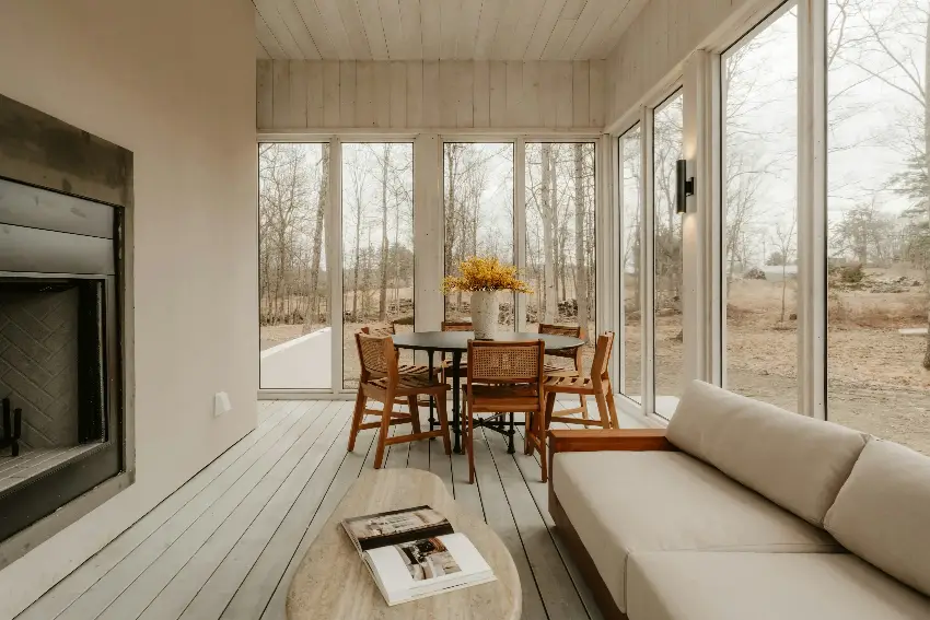Modern living room with fireplace and large windows
