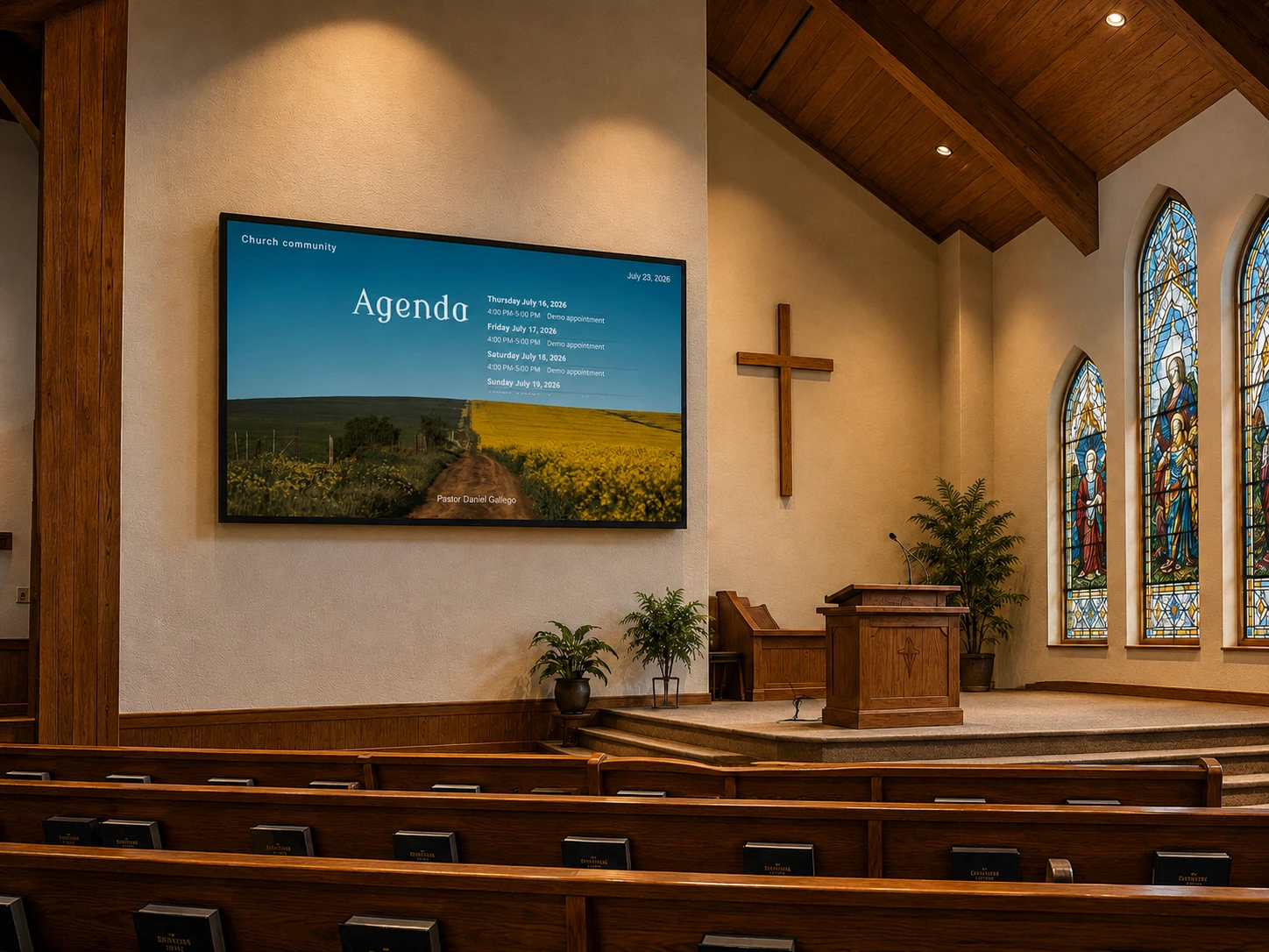 Church lobby with wall-mounted digital signage screen displaying welcome message and upcoming service times.