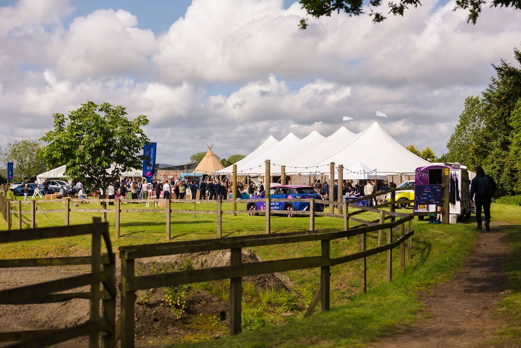 Attendees exploring Octopus EV dashboard features