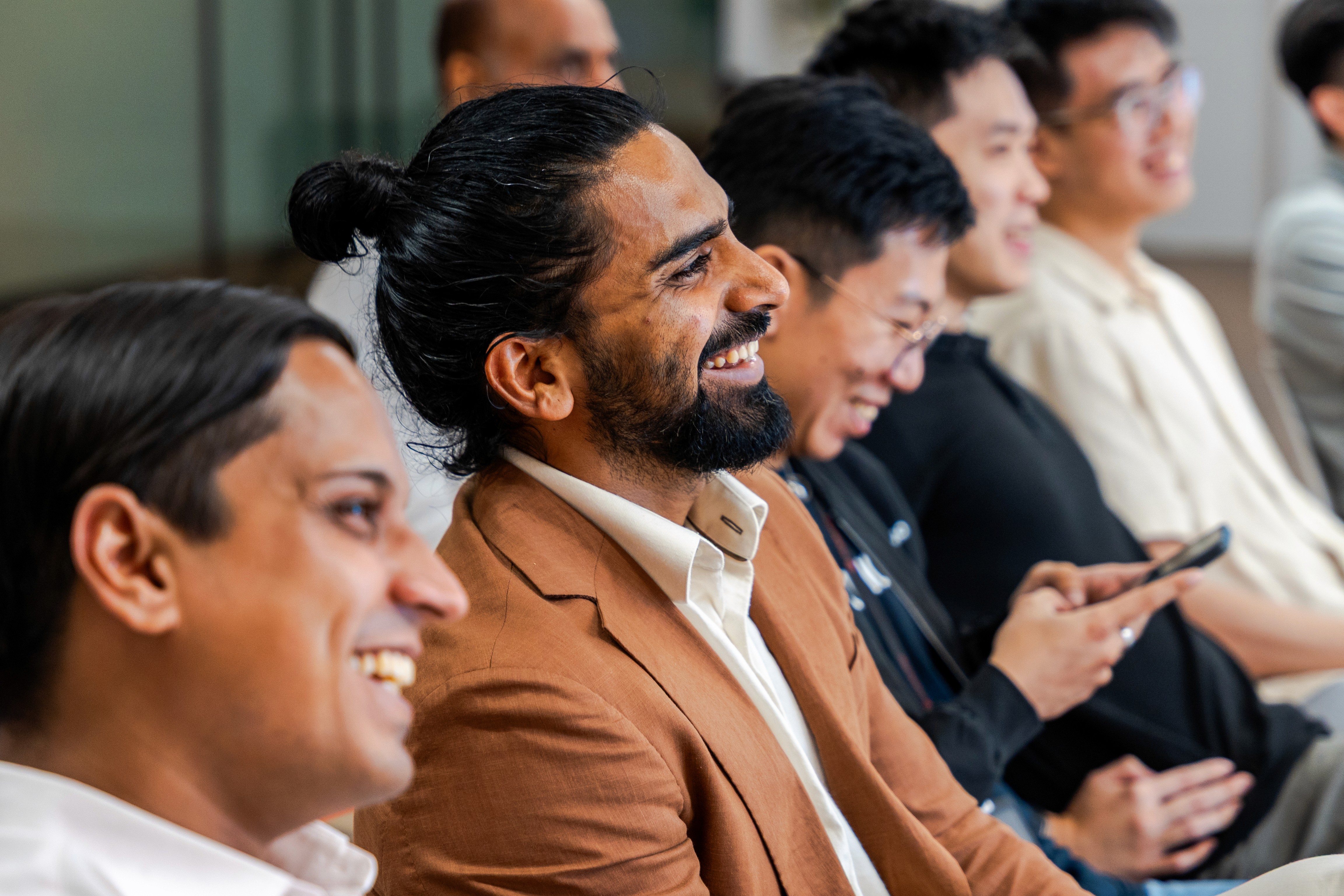 group of people using laptop computer