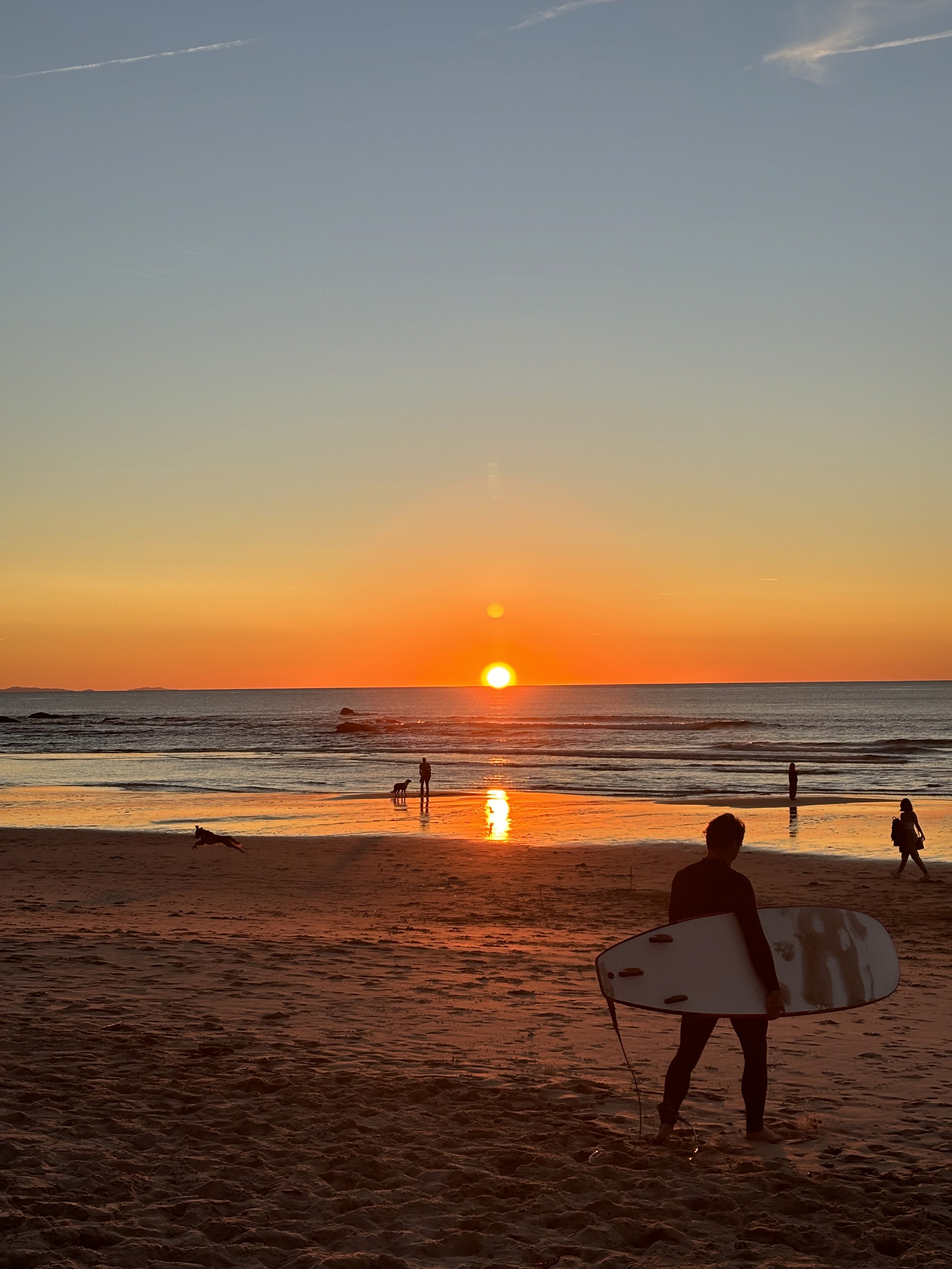 Friends laughing and posing inside a car