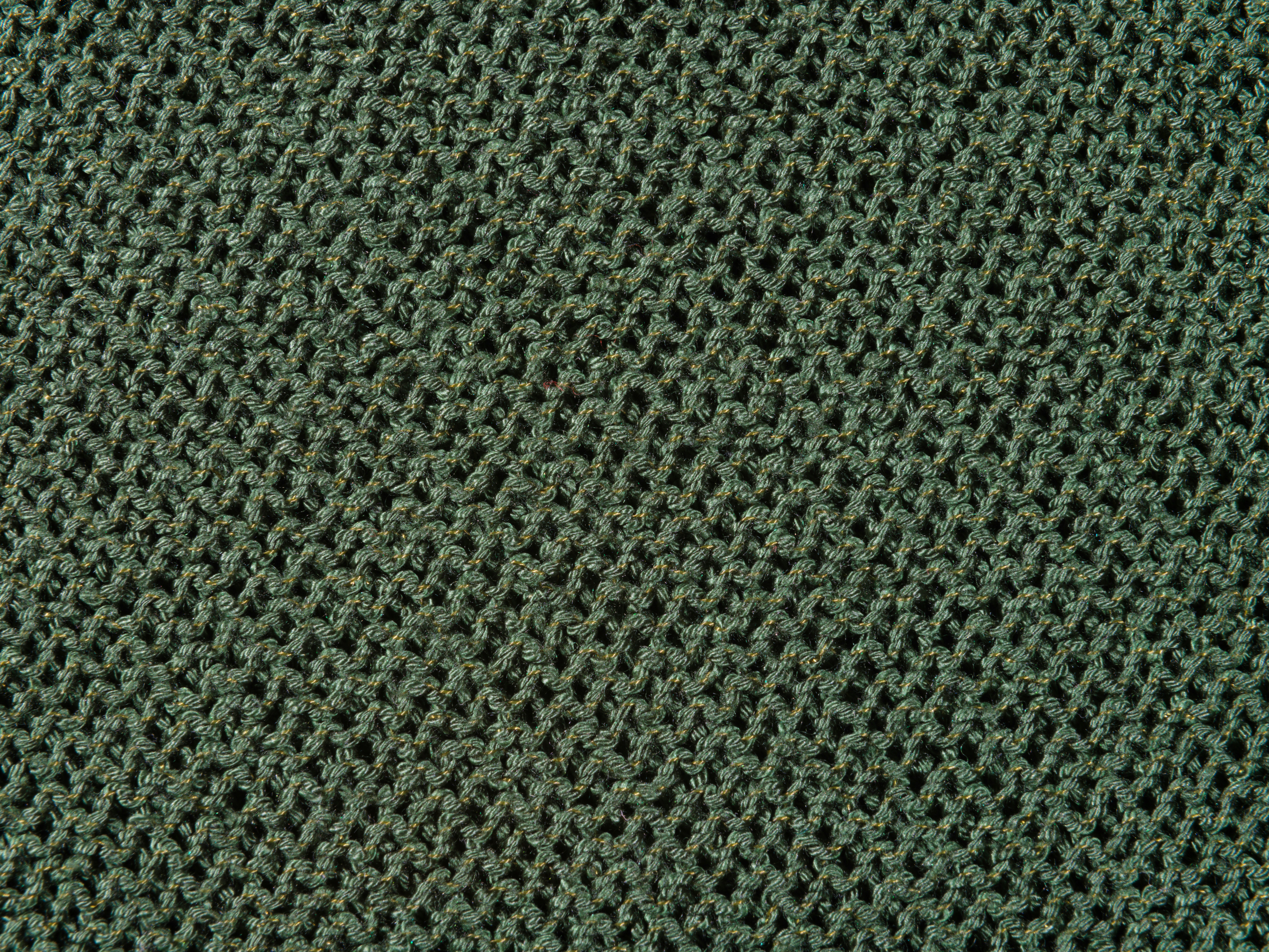 a close up view of a gray fabric