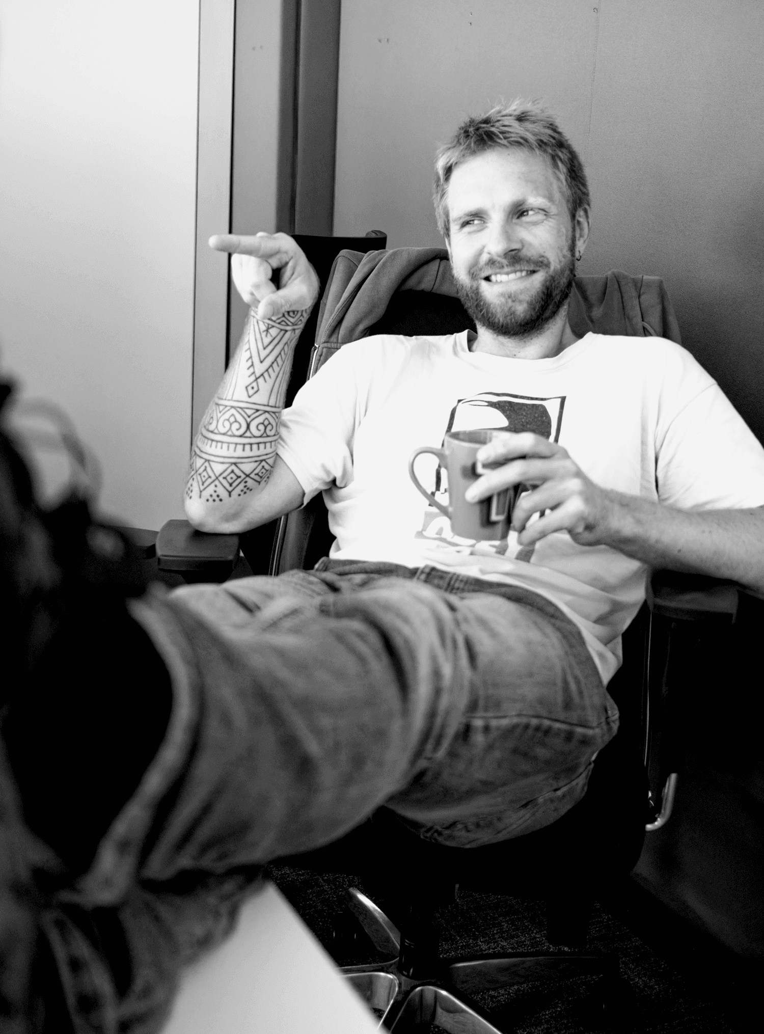 a blurry photo of a person standing in front of a wall