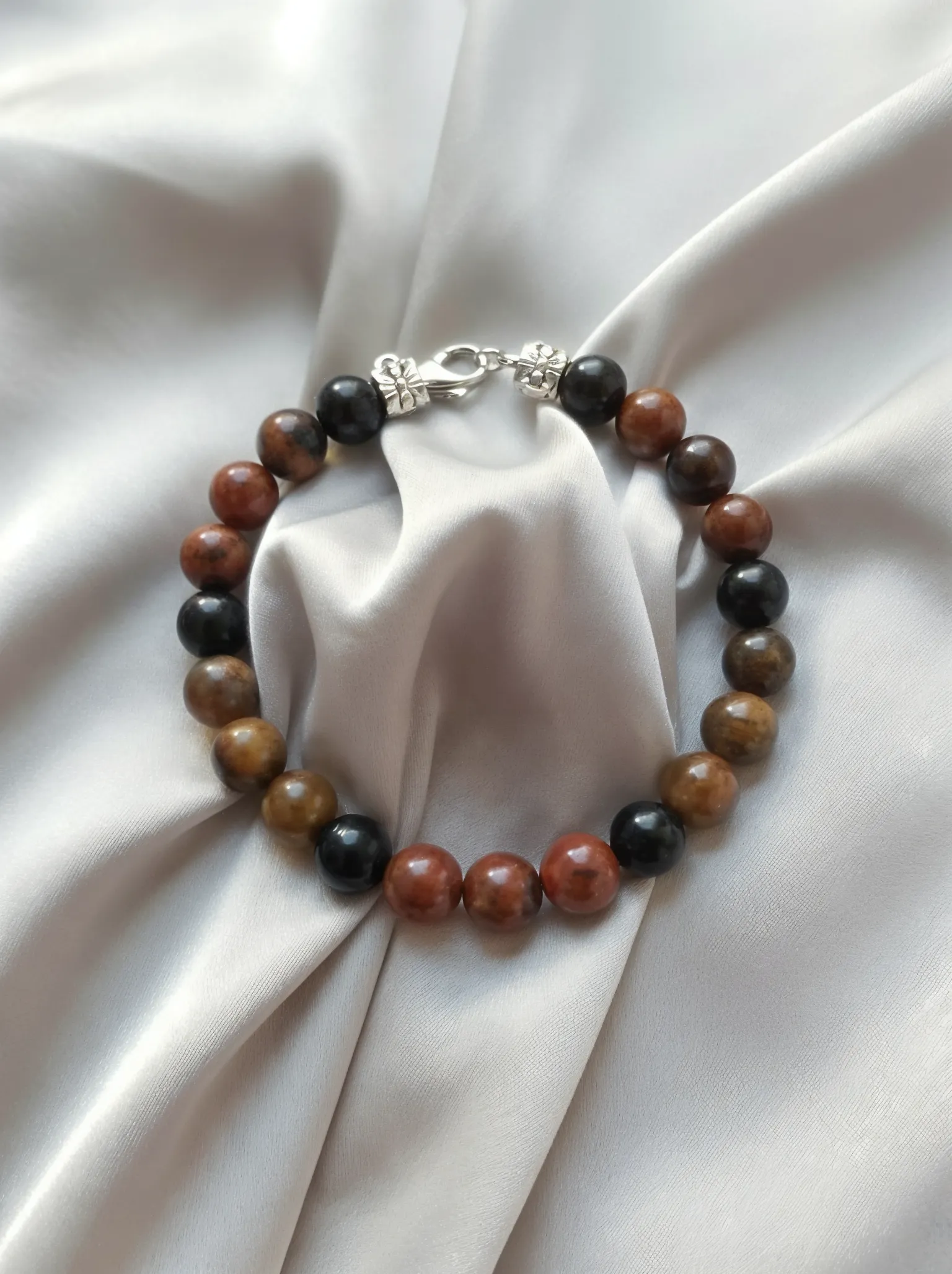 Bracelet placed on a fabric setting.