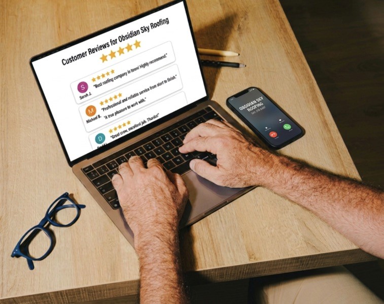 person on laptop reading OSR reviews