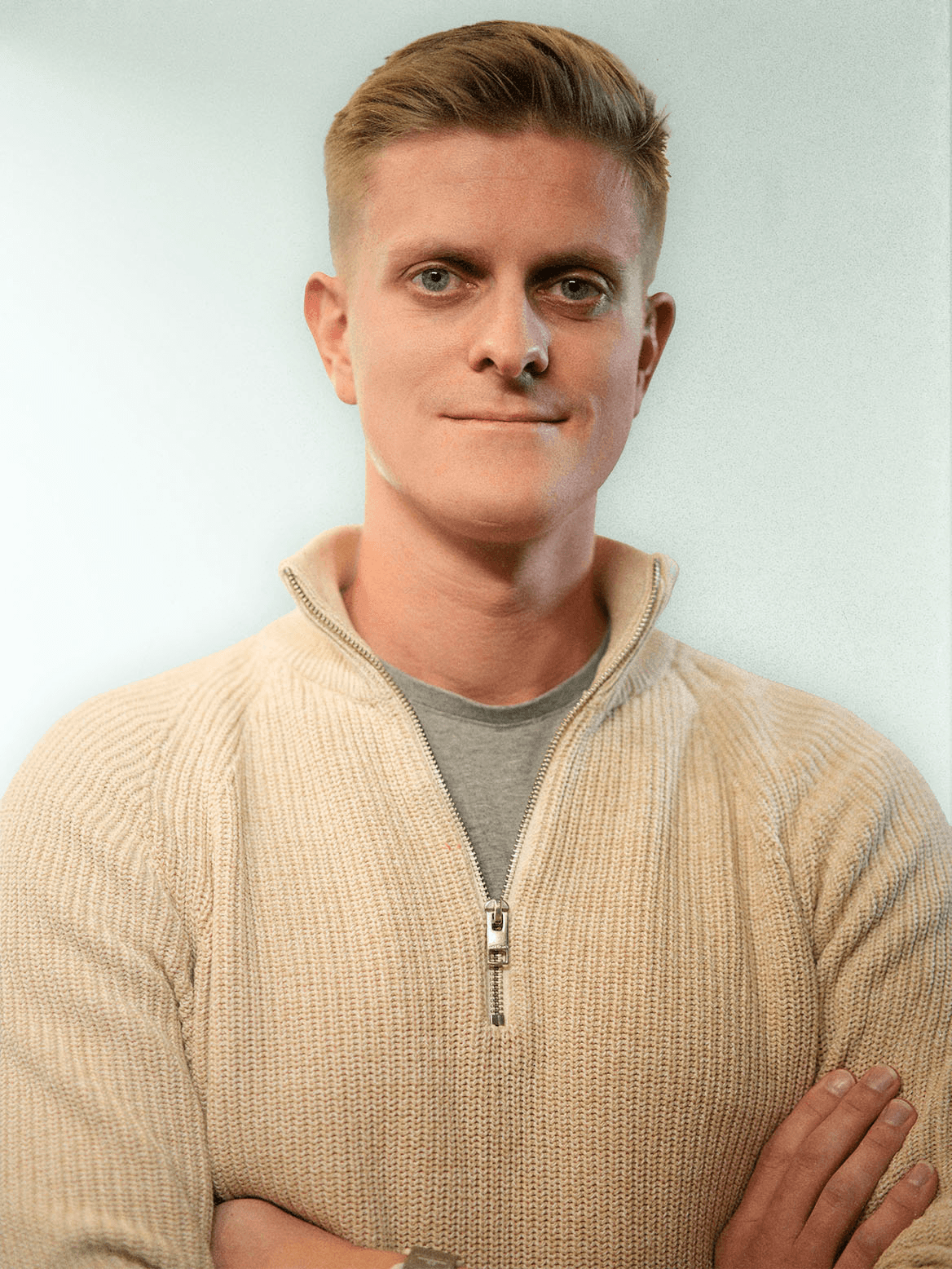 man standing beside wall